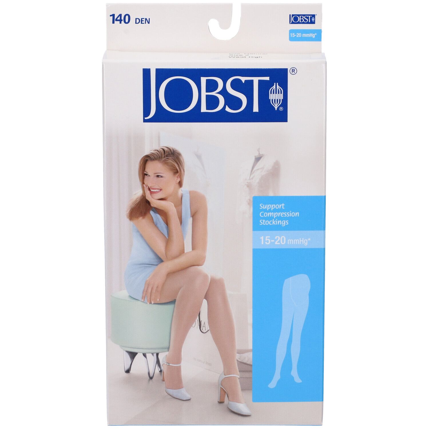 Confezione JOBST con calze a compressione. Scritto: 15-20 mmHg, beige. Donna seduta su uno sgabello.