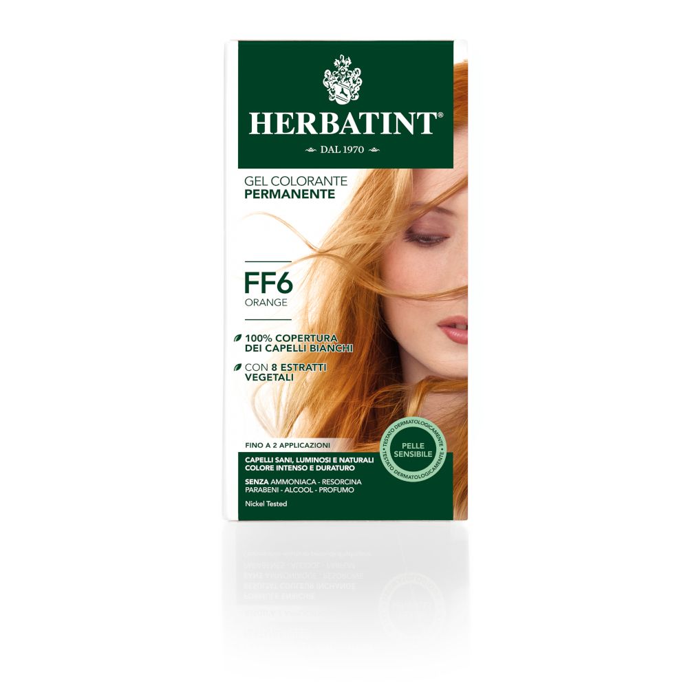 HERBATINT® FF6 Orange. Gel colorante permanente. Confezione con donna e capelli arancioni.