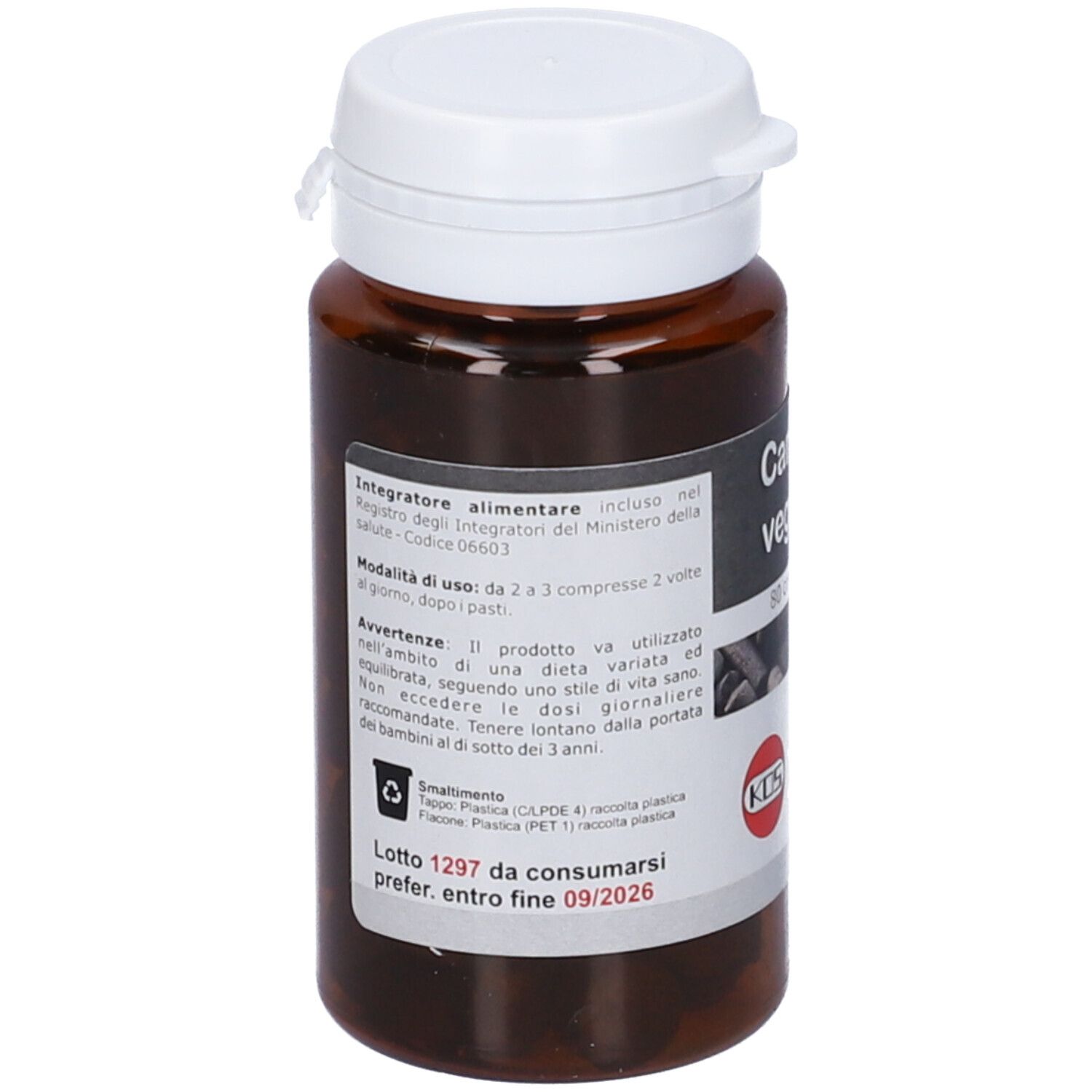 Flacone marrone KOS Carbone Vegetale Compresse. Scritta ed etichetta con ingredienti e istruzioni per l'uso.