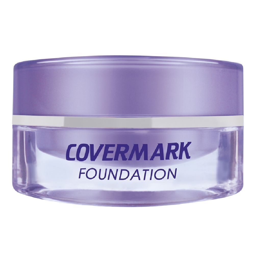 Vasetto rotondo con coperchio viola. Sotto, COVERMARK FOUNDATION in blu.