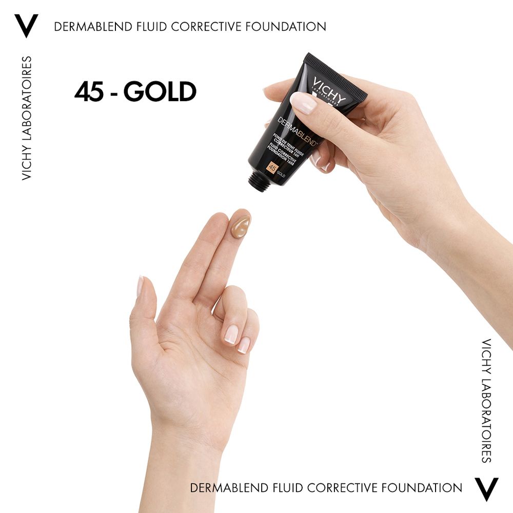 Hand mit Make-up-Tube, gibt Make-up auf den Finger. Farbton 45 Gold.
