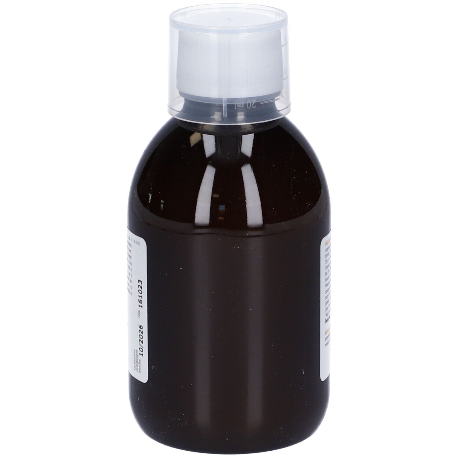 Liquido marrone in bottiglia con tappo bianco. Etichetta con informazioni prodotto e data di scadenza.
