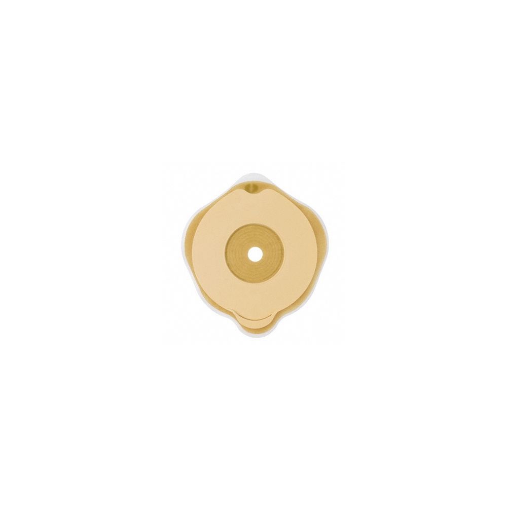 Dispositivo medico rotondo beige con foro centrale. Su sfondo bianco.