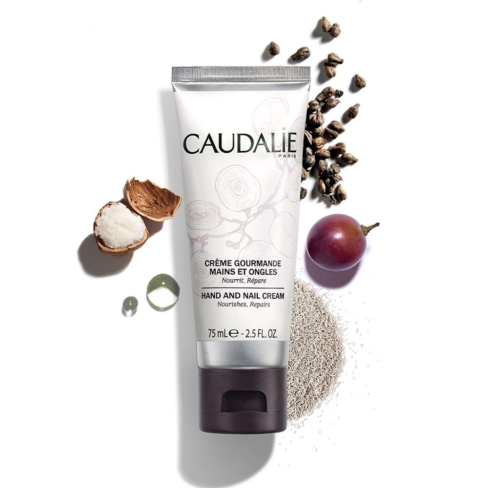 Tube de crème CAUDALÍE avec raisins, pépins et pépins de raisin. Texte: Crème Gourmande Mains et Ongles, Hand and Nail Cream. 75 ml.