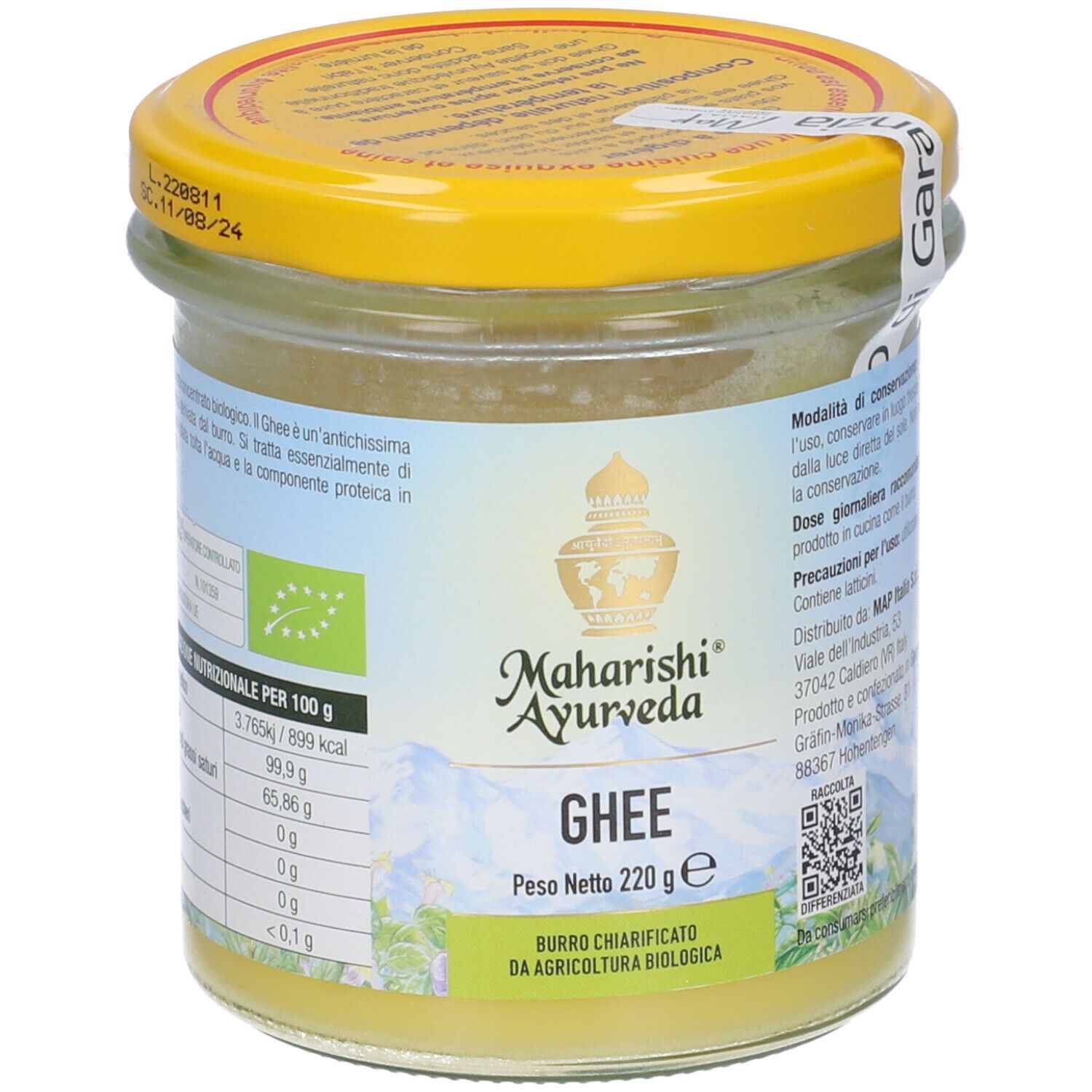 Vasetto di ghee. Grasso giallo, coperchio giallo. Scritte: Maharishi Ayurveda, Ghee, Peso Netto 220g. Sigillo biologico.