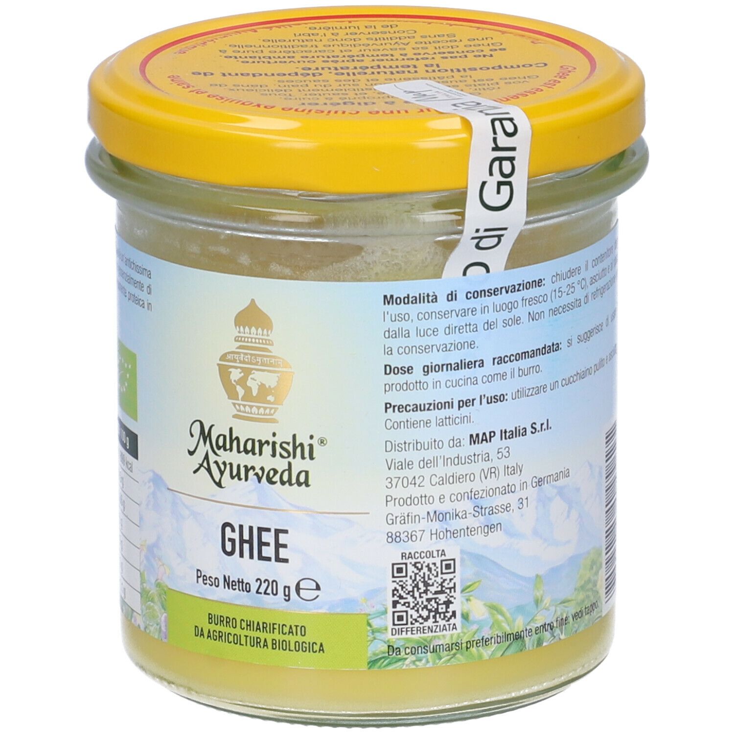 Vasetto di ghee. Grasso giallo, coperchio giallo. Scritte: Maharishi Ayurveda, Ghee, Peso Netto 220g. Sigillo biologico. Etichetta.