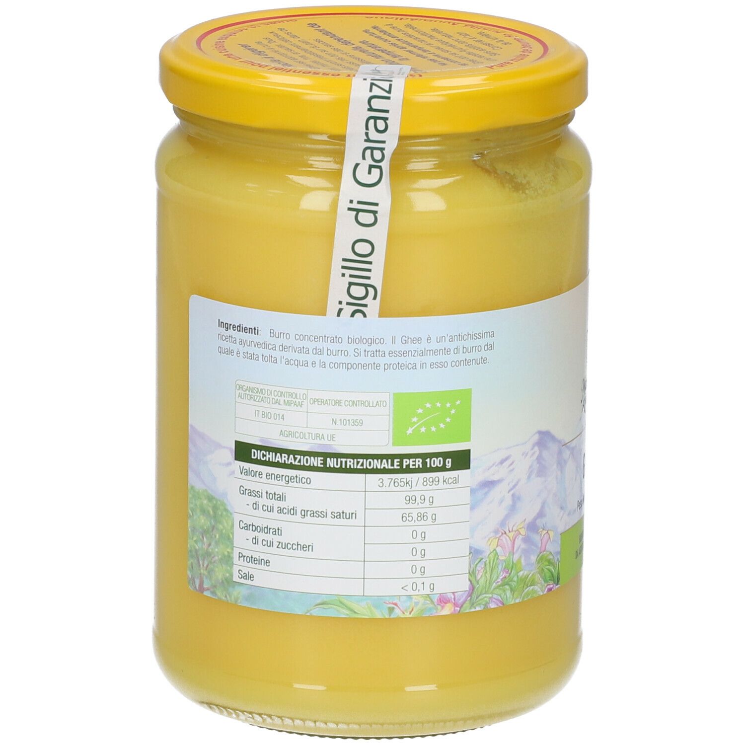 Retro del vasetto di ghee. Etichetta con informazioni nutrizionali. Sigillo biologico. Grasso giallo visibile.