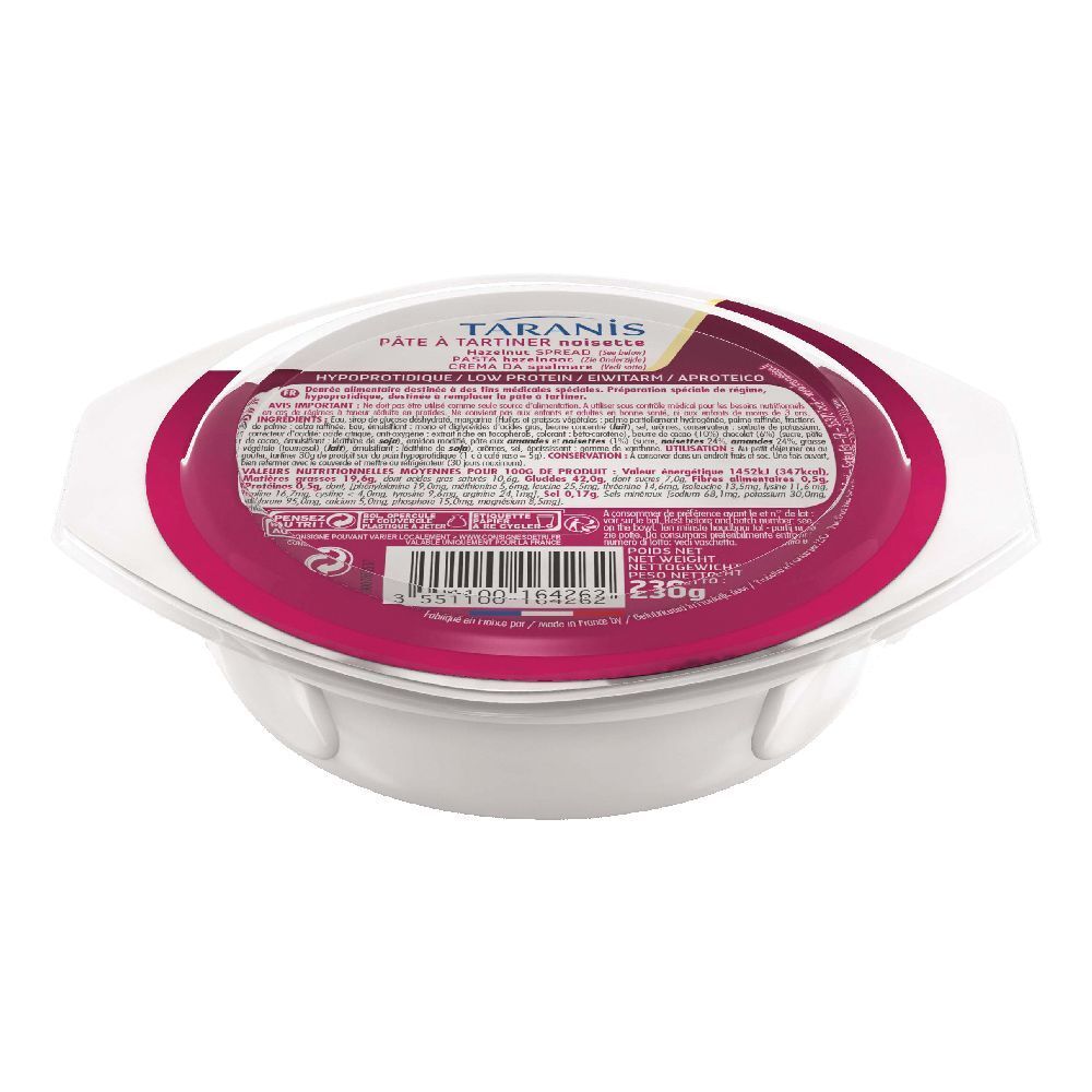 Contenitore bianco con coperchio rosso e coperchio trasparente. Etichetta del prodotto con testo. Scritta: Taranis.