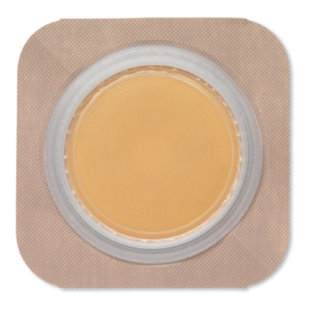 Compresa medica rotonda beige con bordo trasparente, su supporto quadrato beige. Vista dettagliata.
