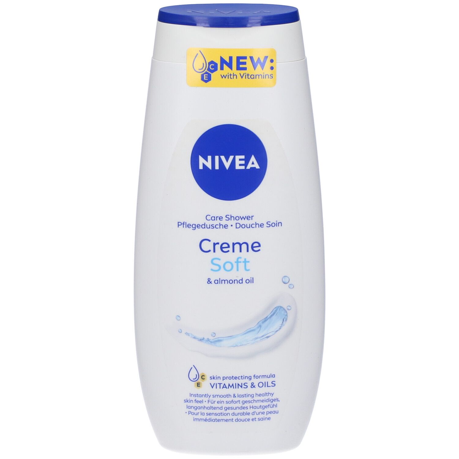Flacone bianco con tappo blu. Testo: Creme Soft & almond oil. Con vitamine. Pflege Dusche. Con vitamine e oli.