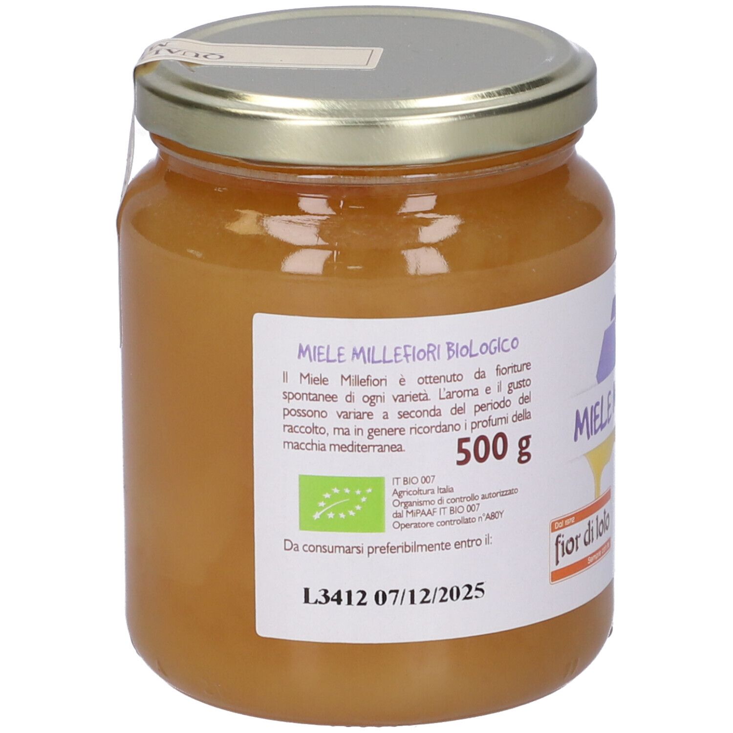 Vasetto di miele. Etichetta con scritta Miele Millefiori, 500 g, marchio bio. Data di scadenza.