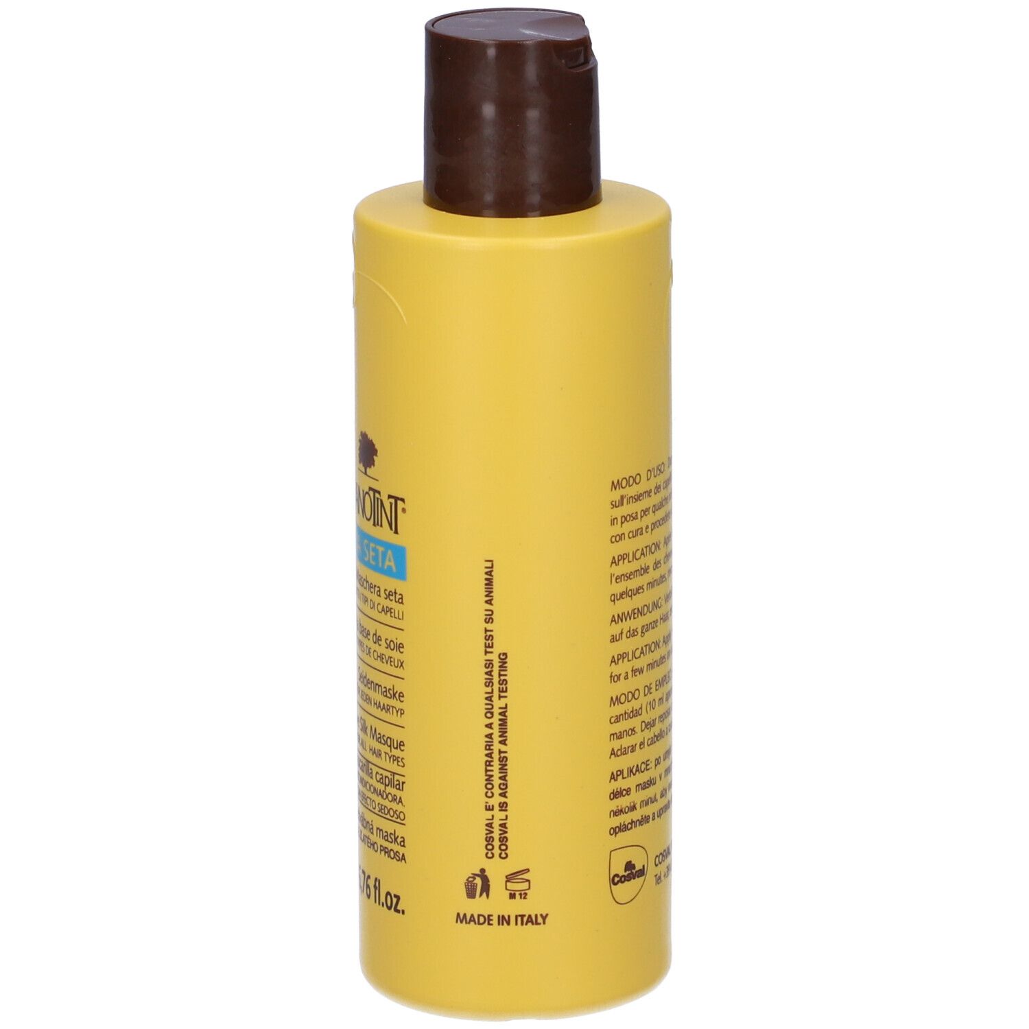 Retro di un flacone giallo con tappo marrone. Testo multilingue.