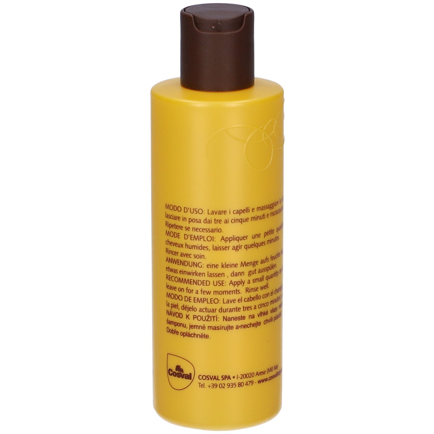 Retro di un flacone di shampoo giallo con tappo marrone. Testo multilingue.