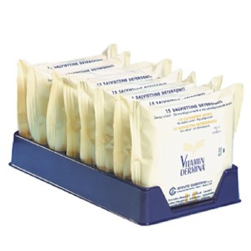 Vassoio blu con più confezioni di salviettine. Scritta: Vitamin Dermina, 15 salviettine detergenti.