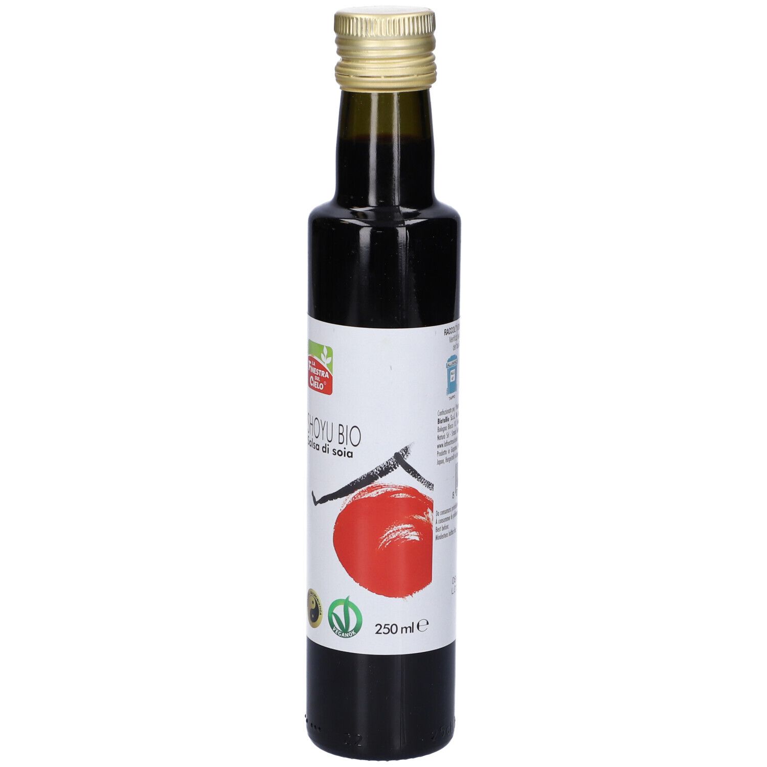 Bottiglia alta in vetro con liquido scuro. Etichetta: Shoyu Bio, Salsa di soia. Tappo dorato.