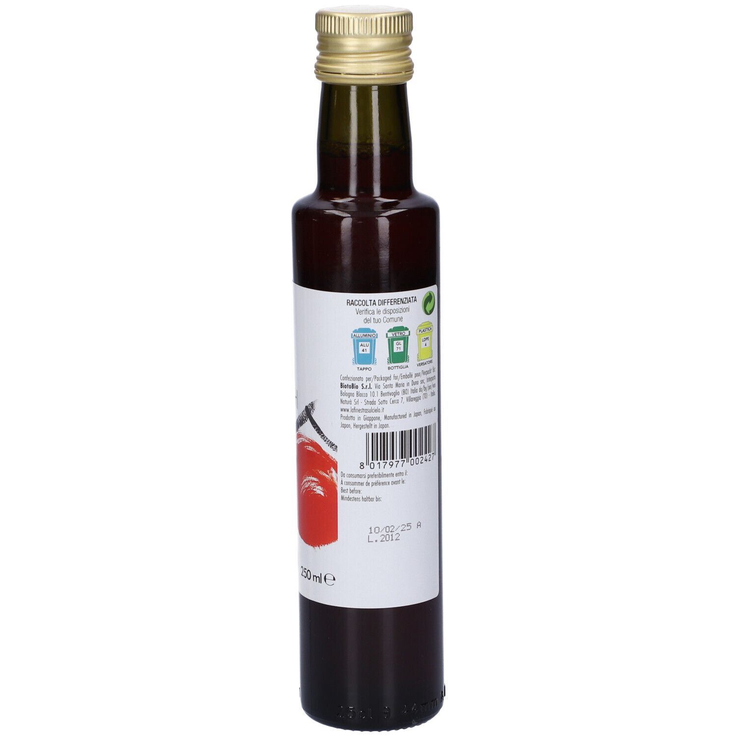 Bottiglia di vetro con liquido rosso. Tappo dorato. Etichetta con testo. Scritta: 250ml.