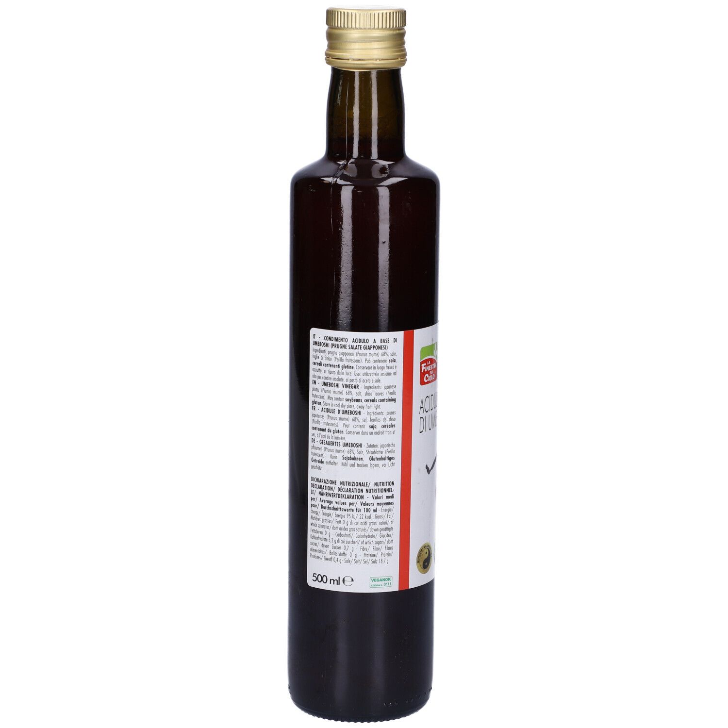 Bottiglia di vetro marrone con liquido rosso. Retro con testo e indicazione 500ml.