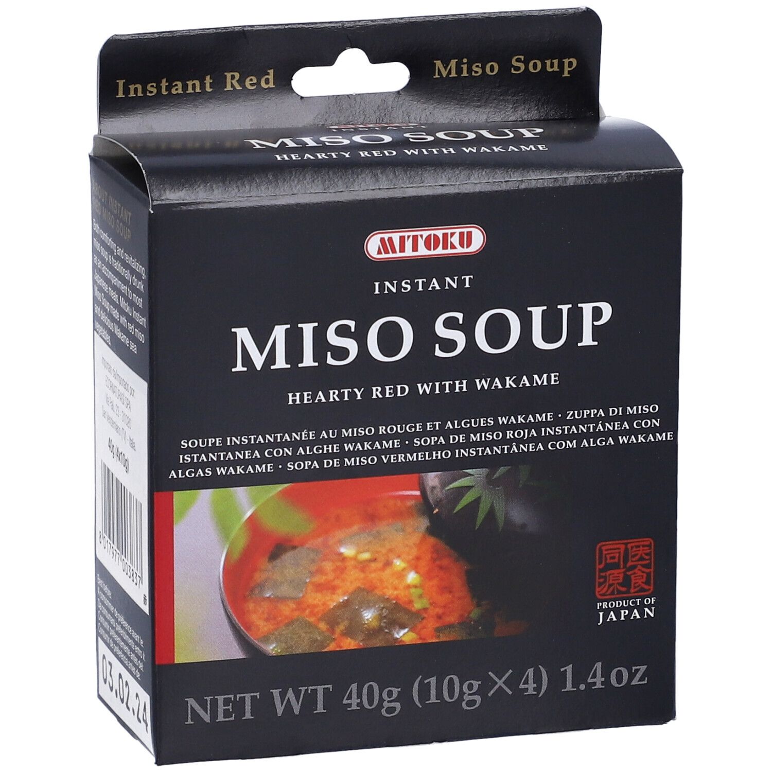 Scatola nera di zuppa di miso. Scritta: MITOKU, MISO SOUP, 40g. Prodotto dal Giappone. Immagine della zuppa.