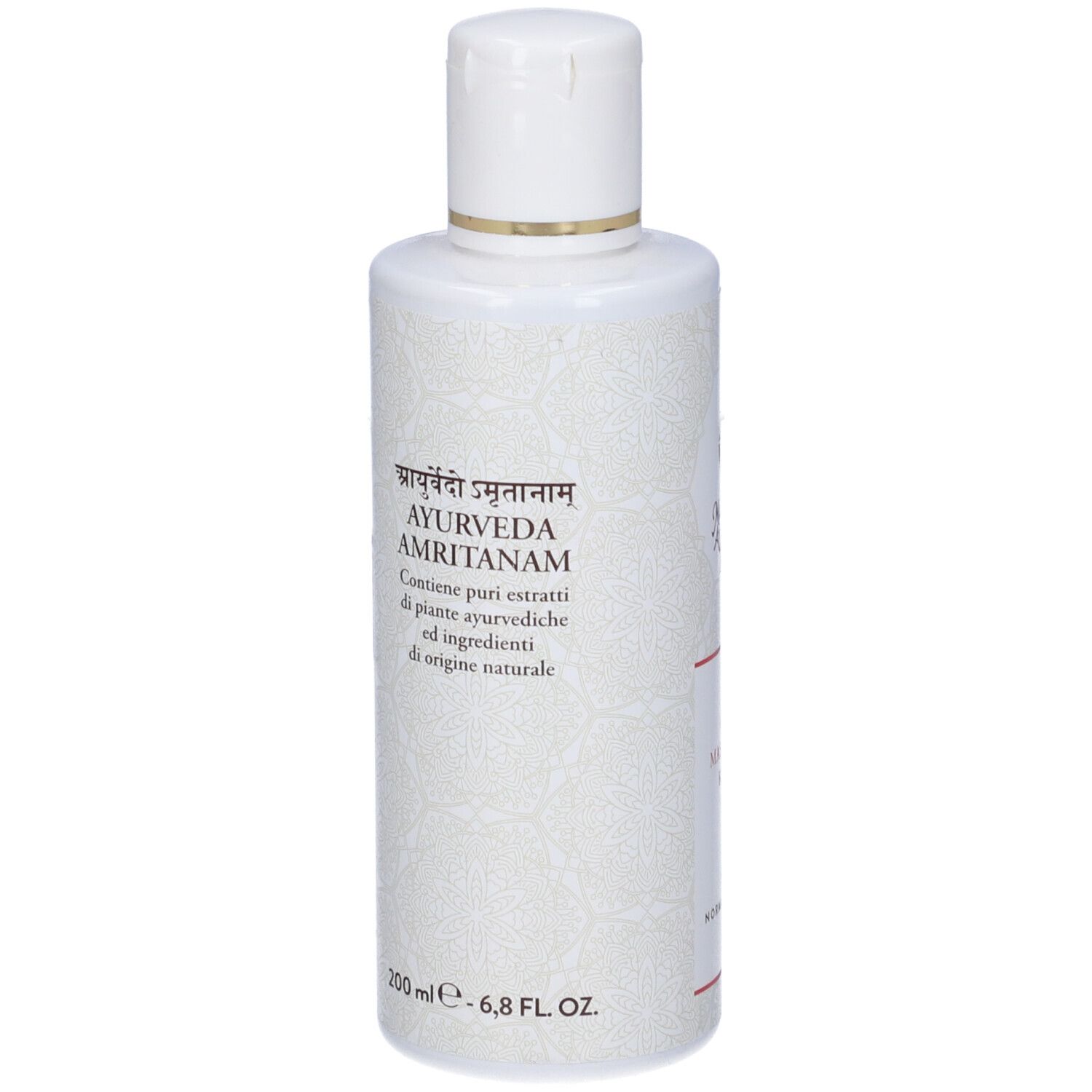 Flacone bianco con tappo bianco. Testo: Ayurveda Amritanam. Contiene estratti di piante ayurvediche. 200 ml.