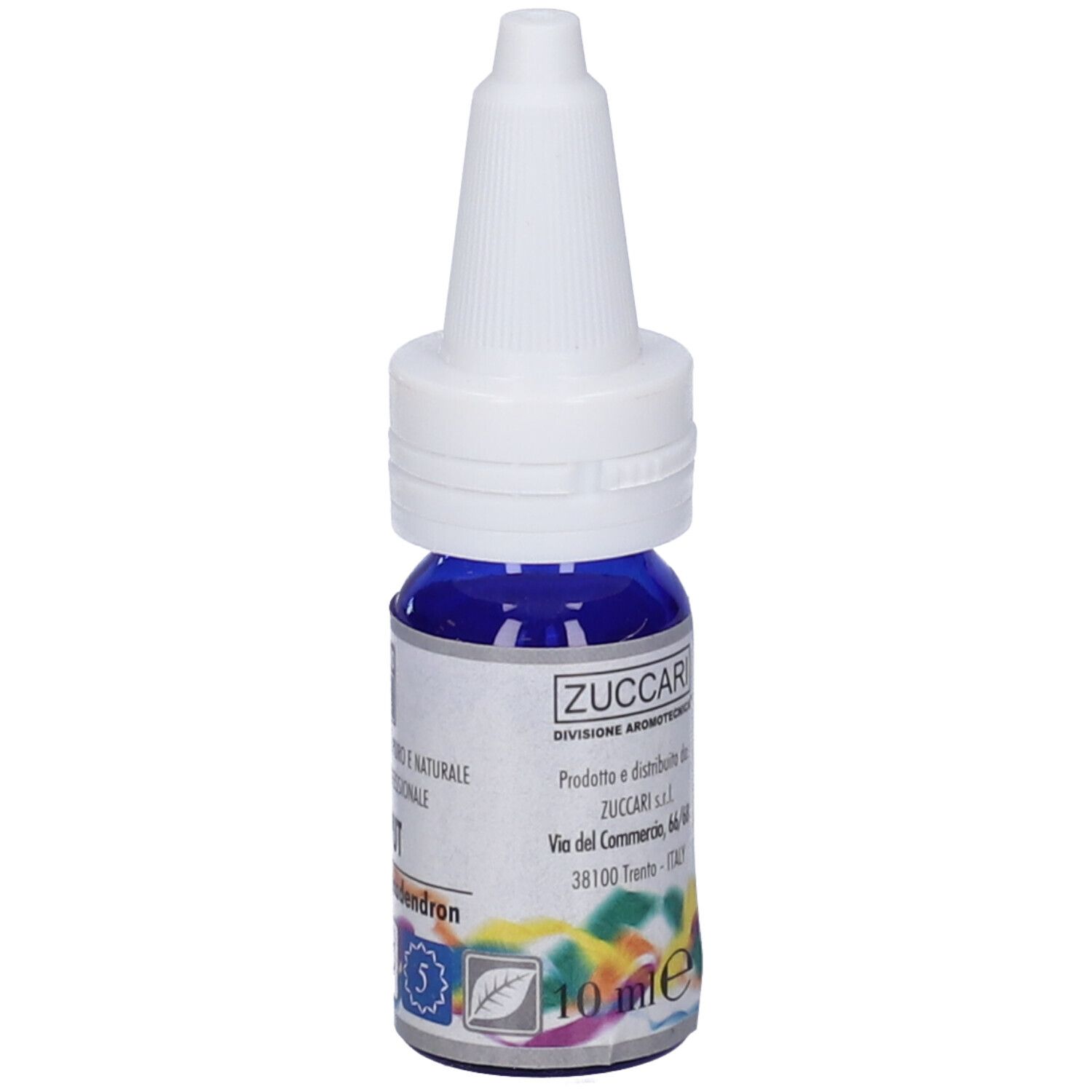 Flacone di olio blu con tappo bianco. Scritto: Cajeput, Melaleuca leucadendron.
