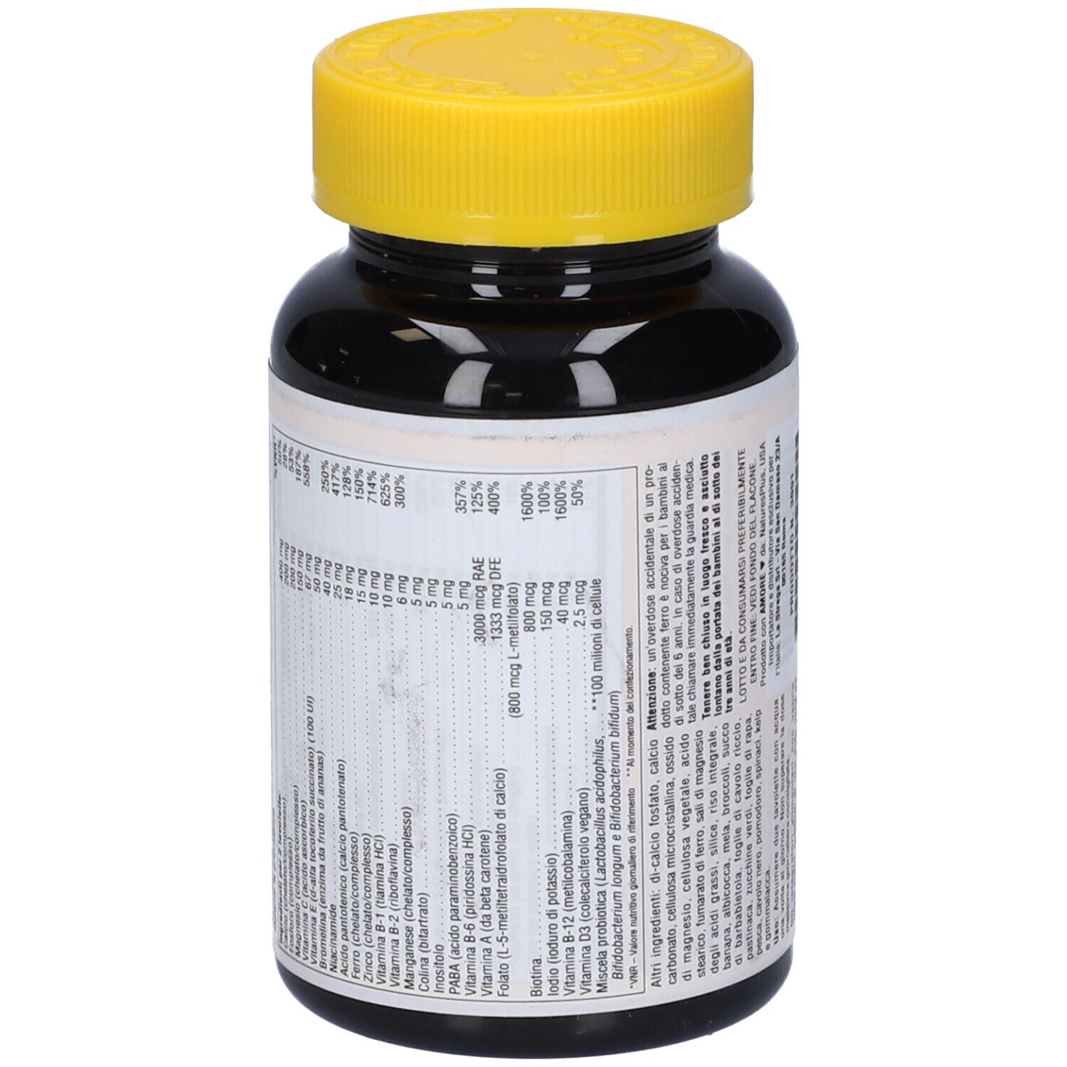 Flacone marrone con tappo giallo. Retro con testo e informazioni nutrizionali. Vegetariano.