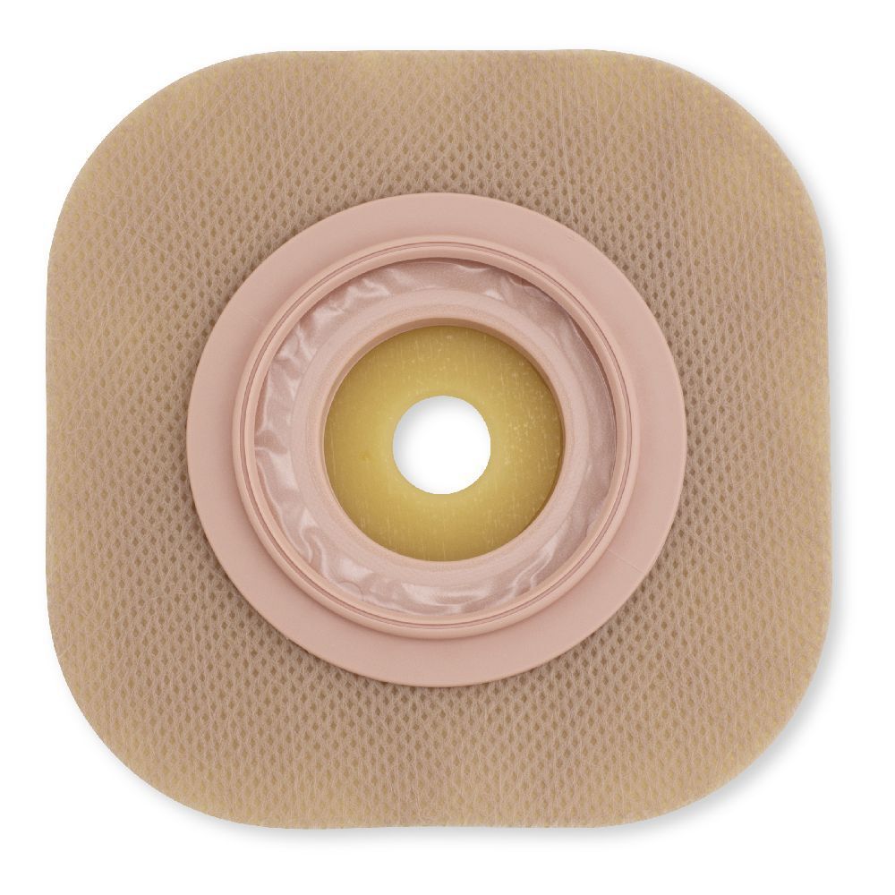 Dispositivo medico. Placca base beige con foro centrale giallo, circondato da un anello rosa.