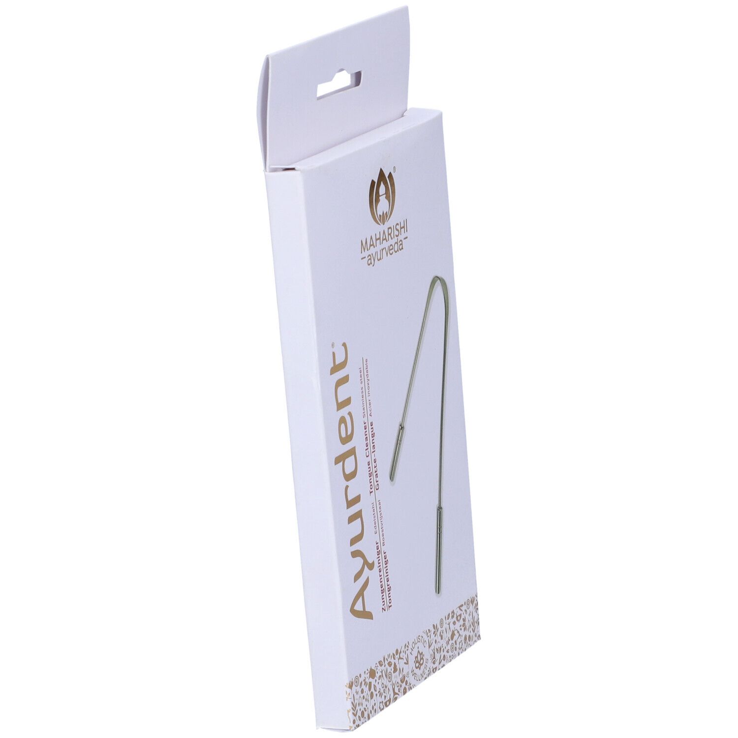 Confezione con pulitore linguale. Scritta: Ayurdent, Maharishi Ayurveda. Pulitore linguale in metallo.