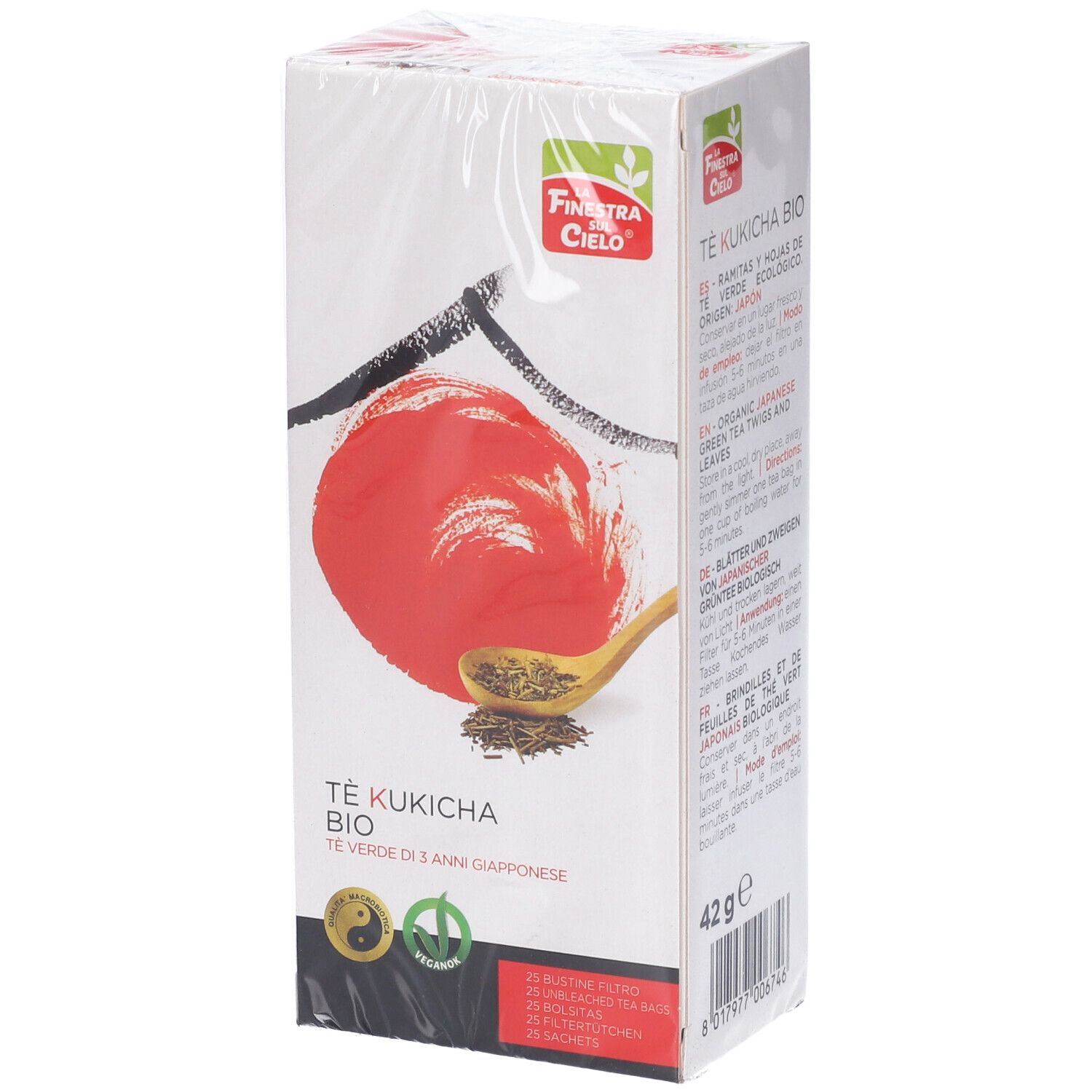 Scatola di tè Kukicha Bio. Cerchio rosso, tratti neri, cucchiaio di legno con tè. Marchio La Finestra sul Cielo.