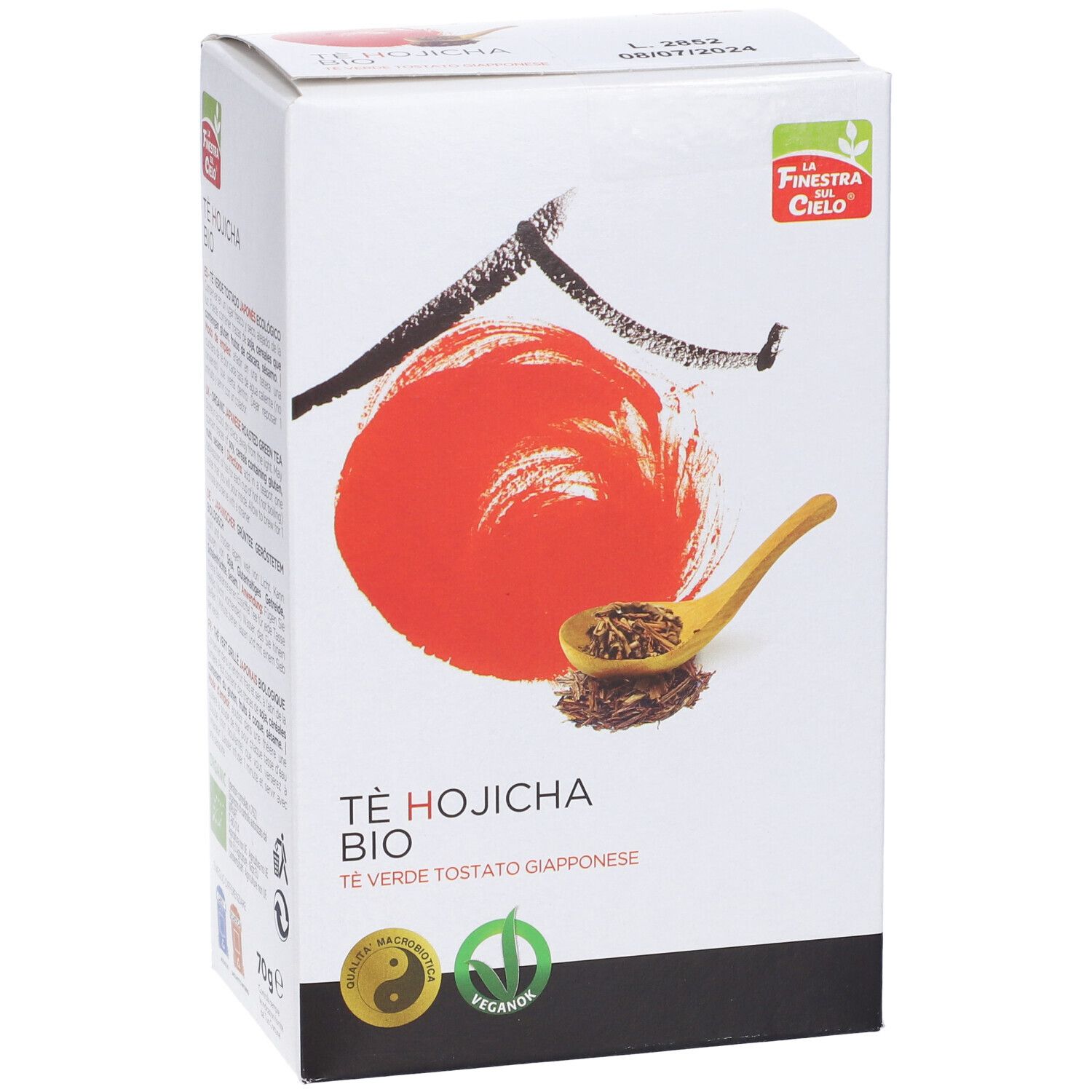 Scatola bianca con cerchio rosso, cucchiaio di tè. Testo: Tè Hojicha Bio. Loghi: Yin-Yang, Vegan. 70g.