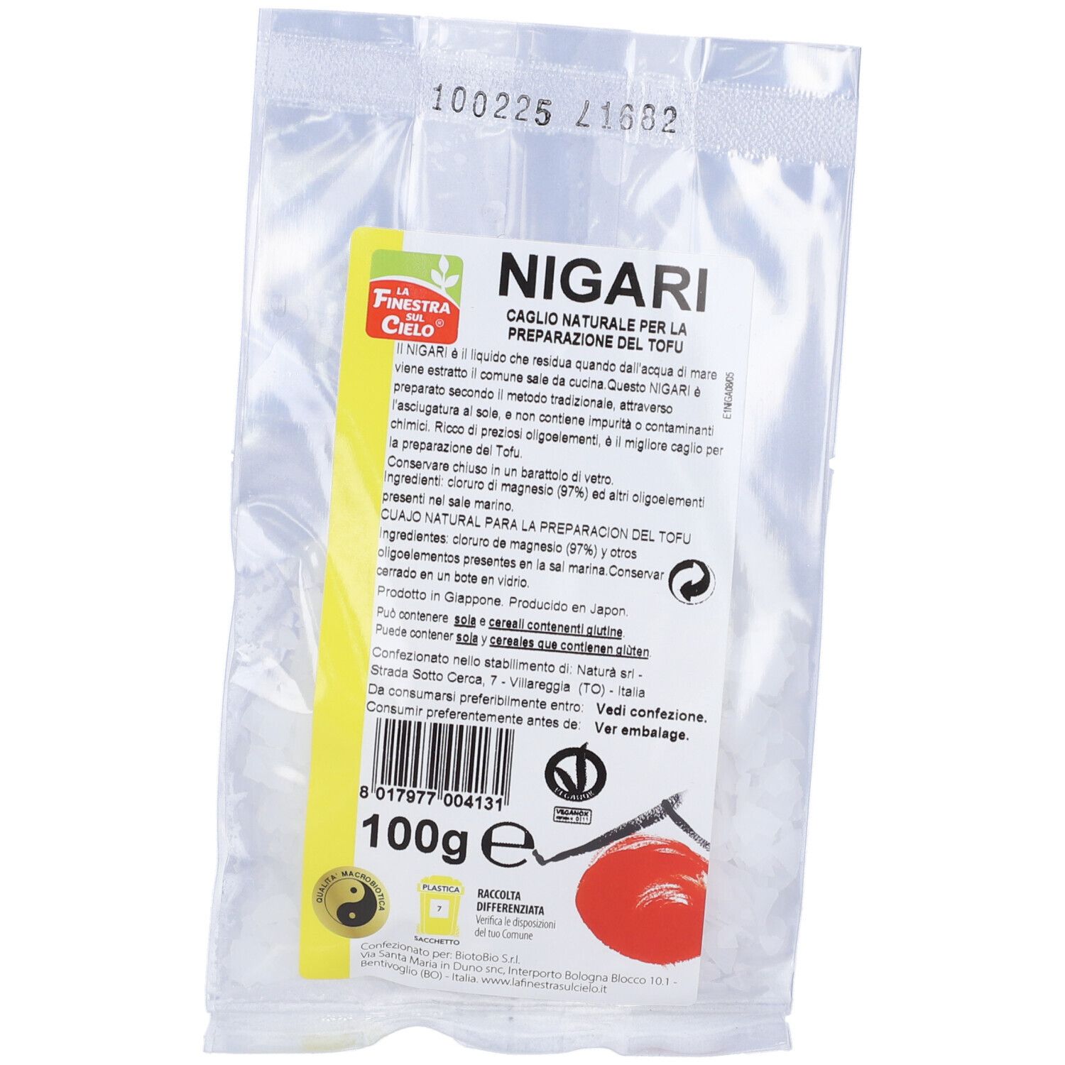 Busta trasparente con contenuto bianco. Scritta "Nigari" e logo. Etichetta gialla con testo italiano. Sigillo.