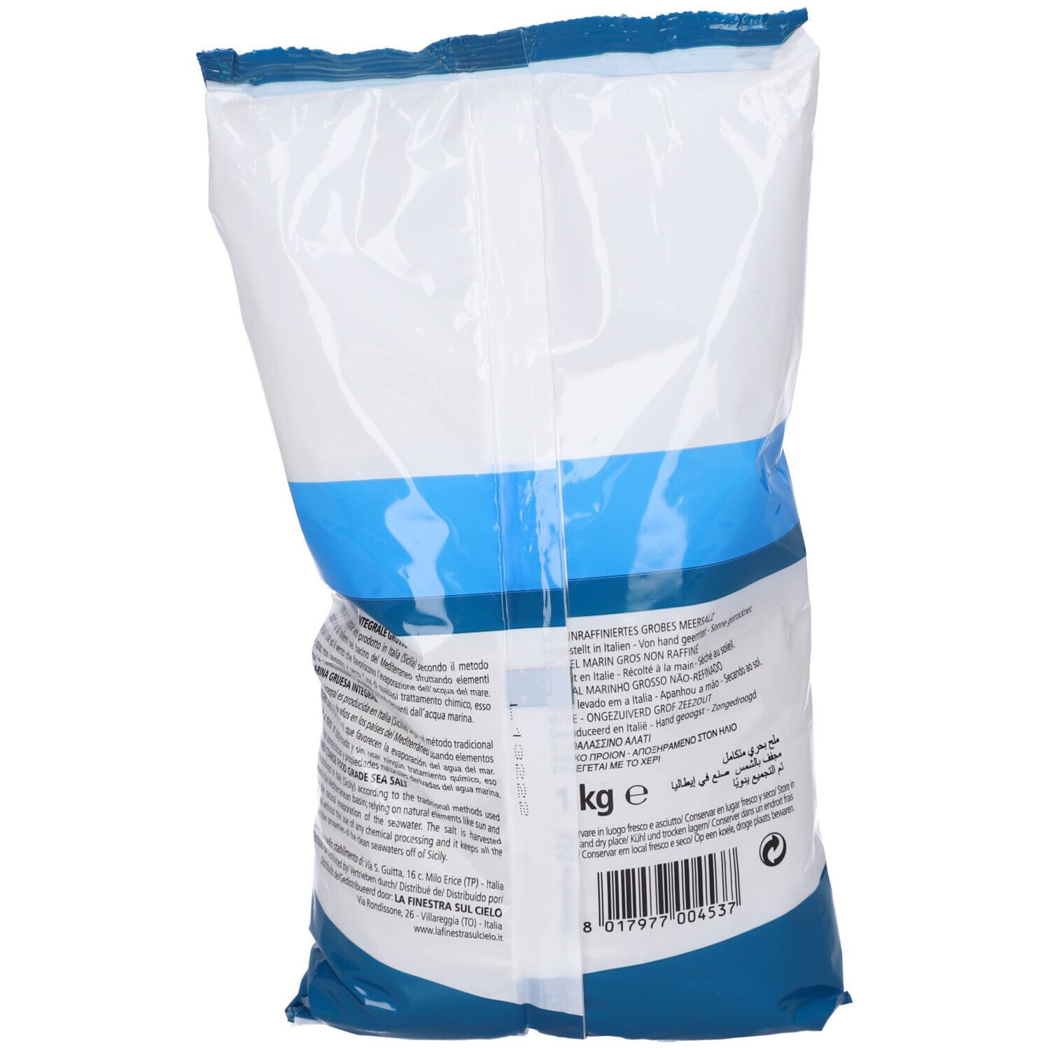 Retro di un sacchetto di sale marino grosso. Confezione blu e bianca. Testo: 1 kg e.