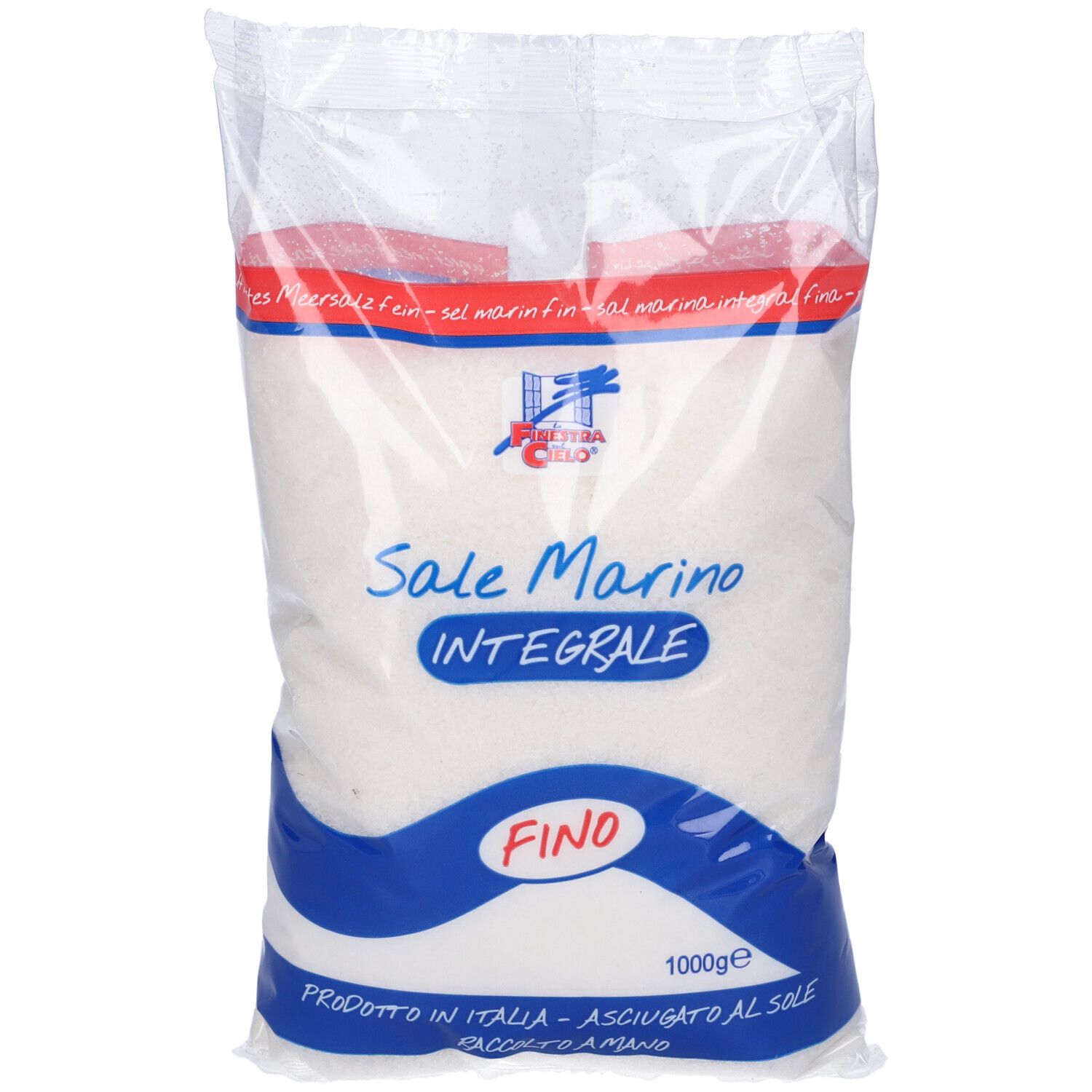 Confezione trasparente di sale marino. Scritta: Sale Marino Integrale Fino. Logo: Fiore di Sale. Peso: 1000g.