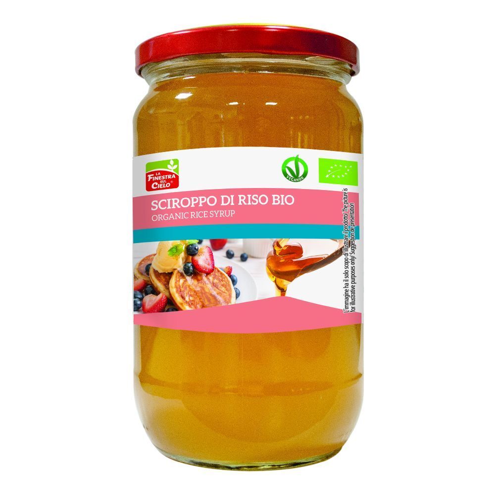 Barattolo di sciroppo di riso bio. Coperchio rosso, etichetta con nome prodotto e immagine pancake.