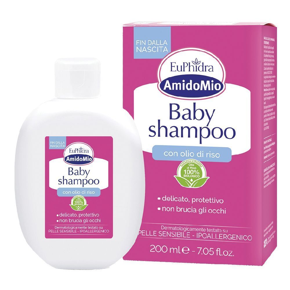 Flacone di shampoo bianco e confezione. Scritta: Euphidra AmidoMio Baby Shampoo. Con olio di riso. 100% biologico.