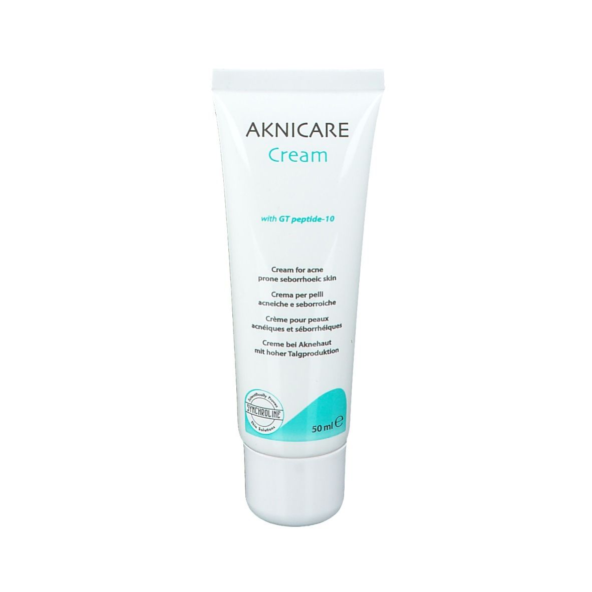 Tubo bianco AKNICARE Cream. Contiene 50 ml. Testo: Cream for acne prone seborrhoeic skin. Con GT peptide-10.