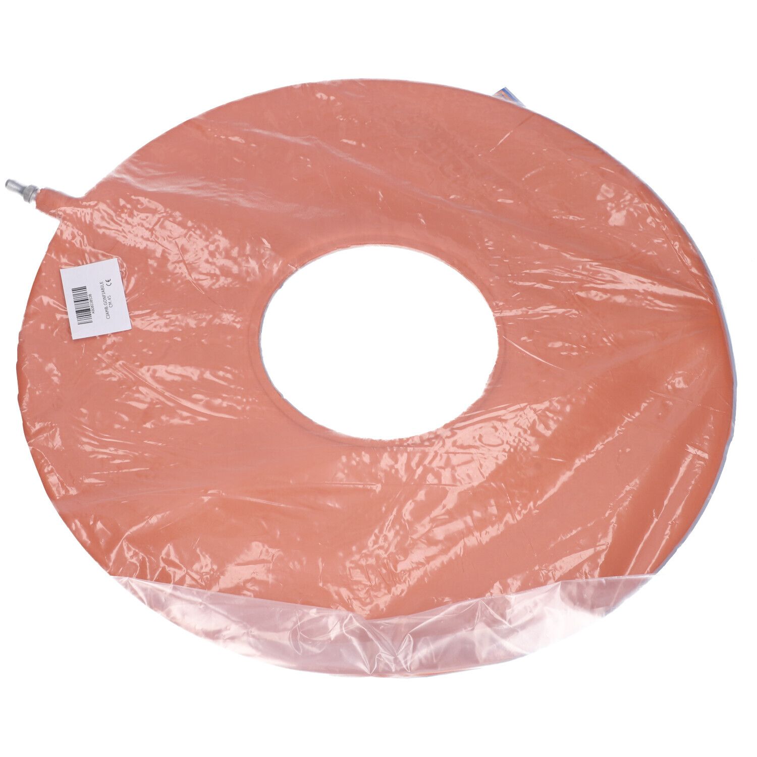 Cuscino antidecubito rotondo arancione in confezione di plastica. Valvola visibile.