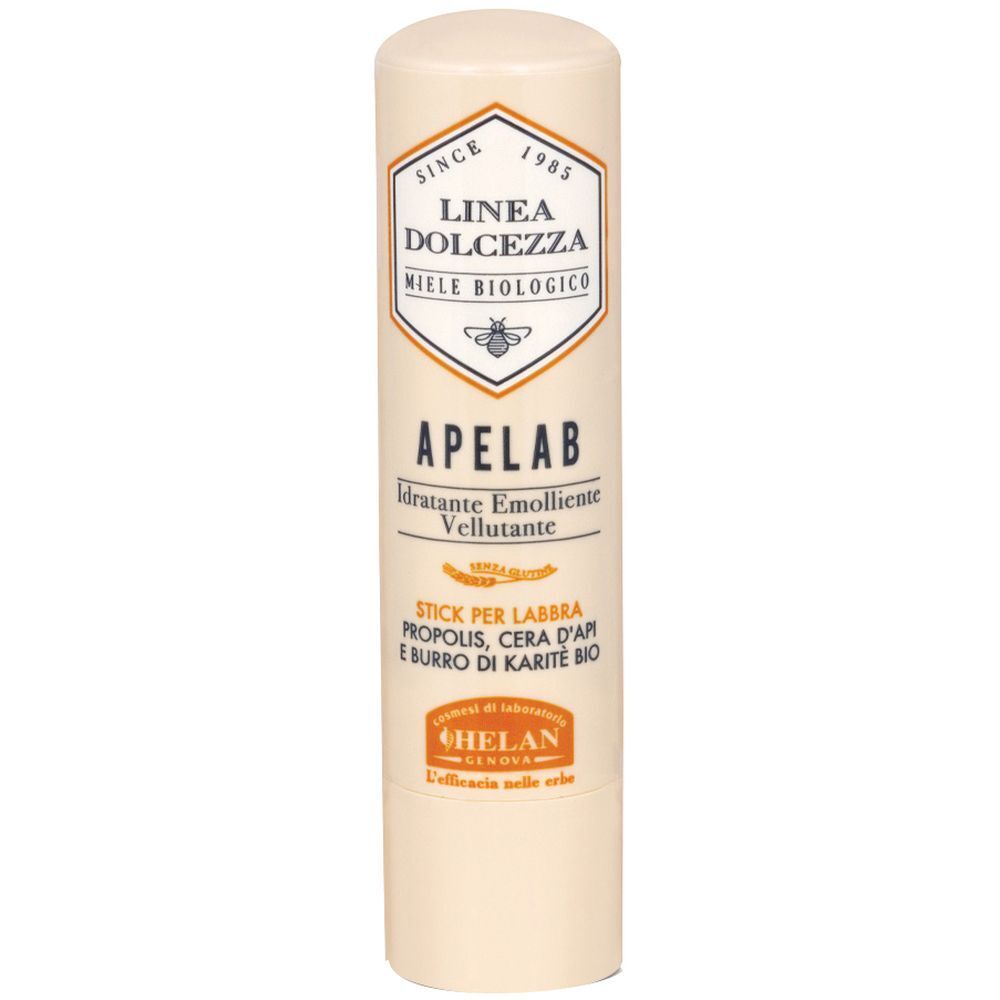 Stick labbra beige. Scritta Apelab. Ingredienti: Propolis, Cera d'Api, Burro di Karité Bio. Marchio Helan. Confezione.