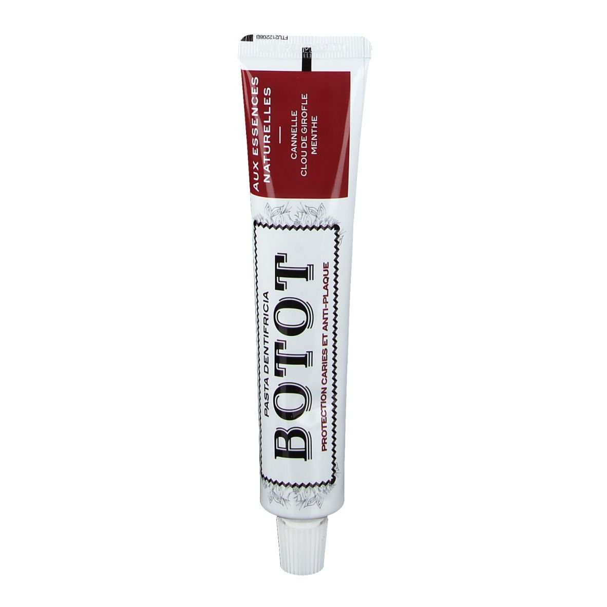 Tubo di dentifricio BOTOT. Scritta: Pasta Dentifricia. Aromi: Cannella, chiodo di garofano, menta. Bianco, rosso e nero.