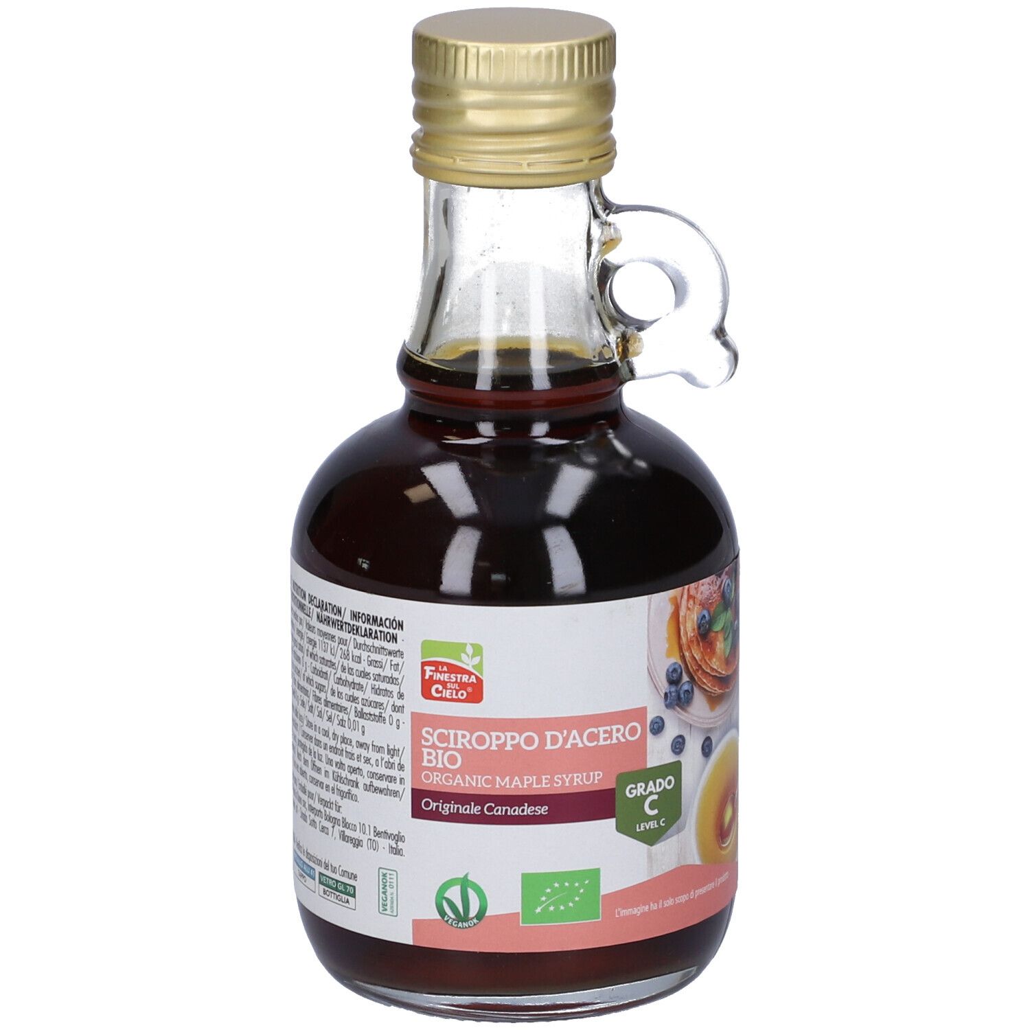 Bottiglia di vetro di sciroppo d'acero. Etichetta con testo: Sciroppo d'Acero Bio, Grado C. Immagine di pancake.