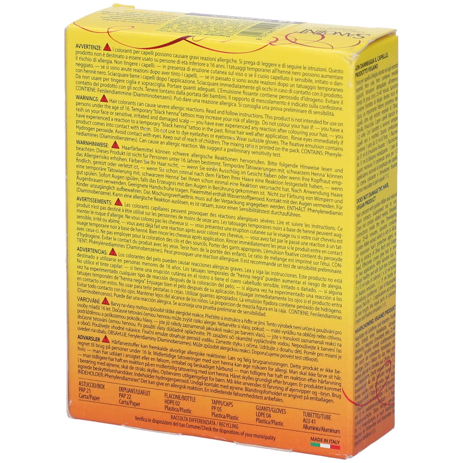 Retro della scatola gialla. Testo multilingue. Contiene informazioni sugli ingredienti e avvertenze.