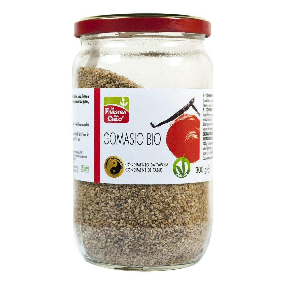 Vasetto di Gomasio Bio. Etichetta con logo, nome prodotto e 300g. Coperchio rosso. Contenuto granulare.