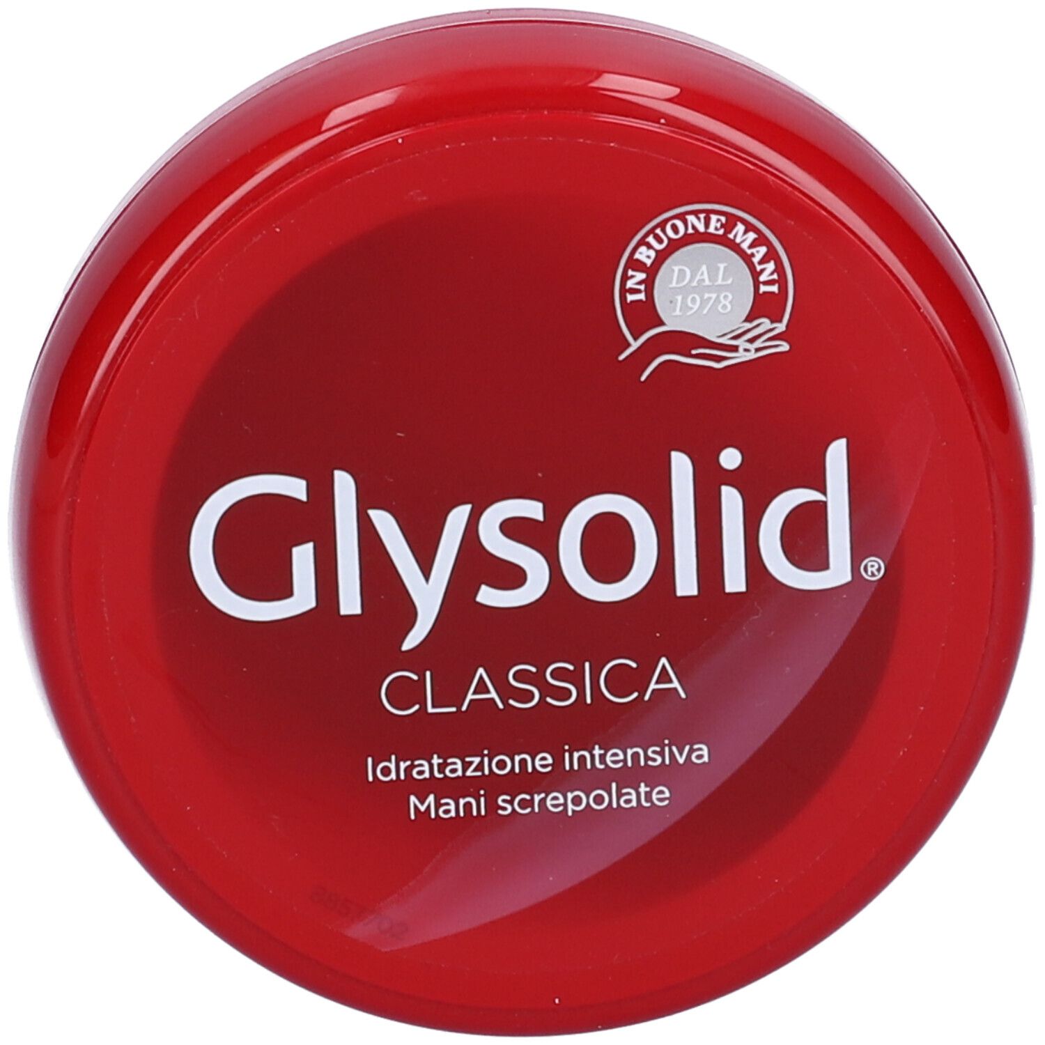 Primo piano di un vasetto rosso. Scritta bianca: Glysolid. Crema mani classica.