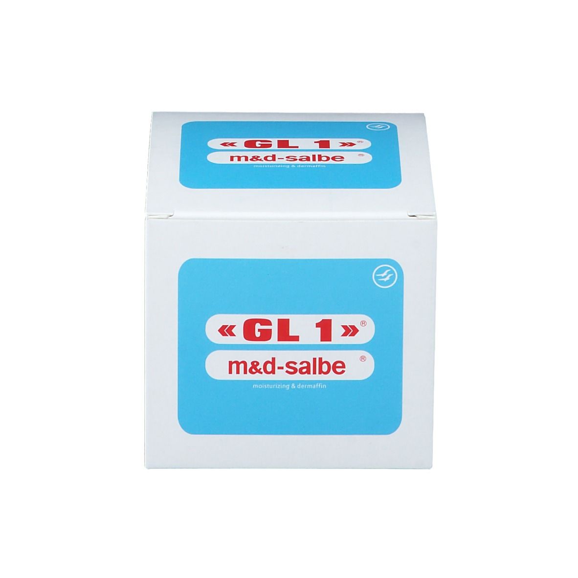 Scatola bianca con etichetta blu. Scritta «GL 1» m&d-salbe. Logo.