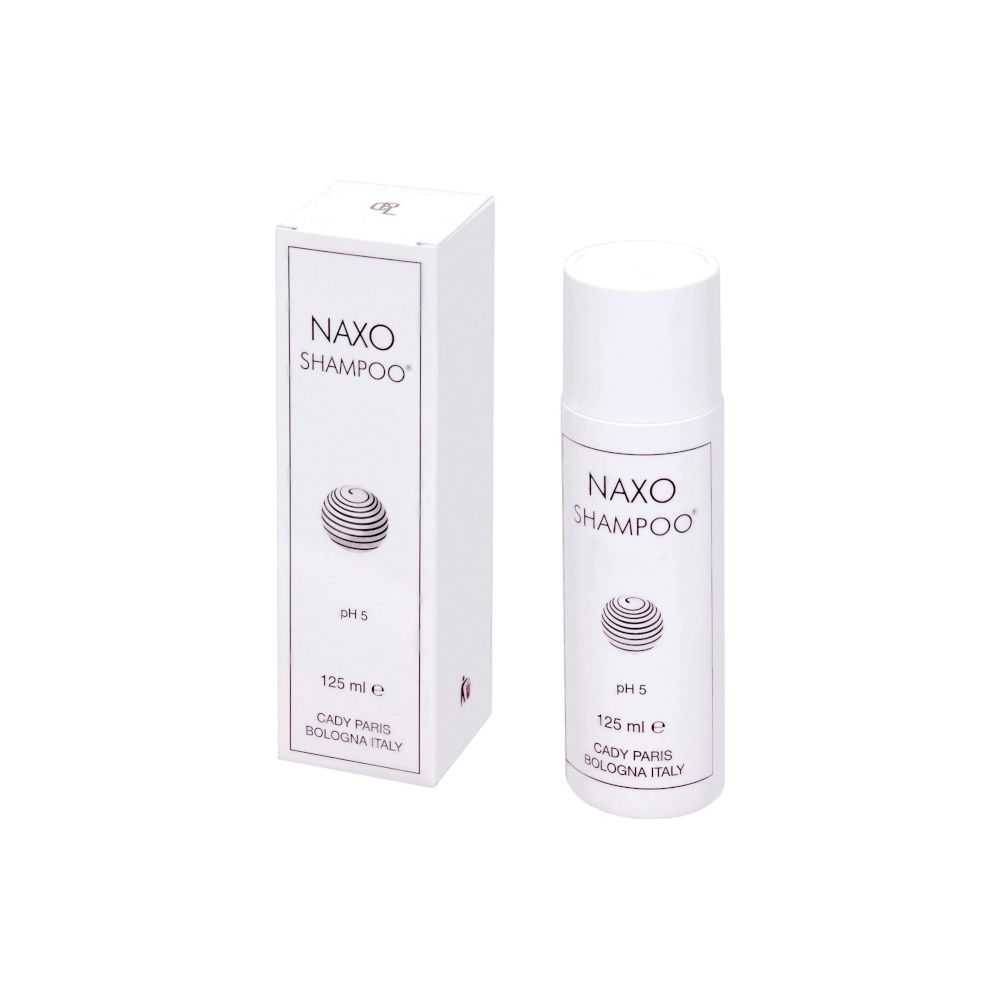 Shampoo bianco con confezione. Scritta: Naxo Shampoo, pH 5, 125 ml. Prodotto a Bologna, Italia.