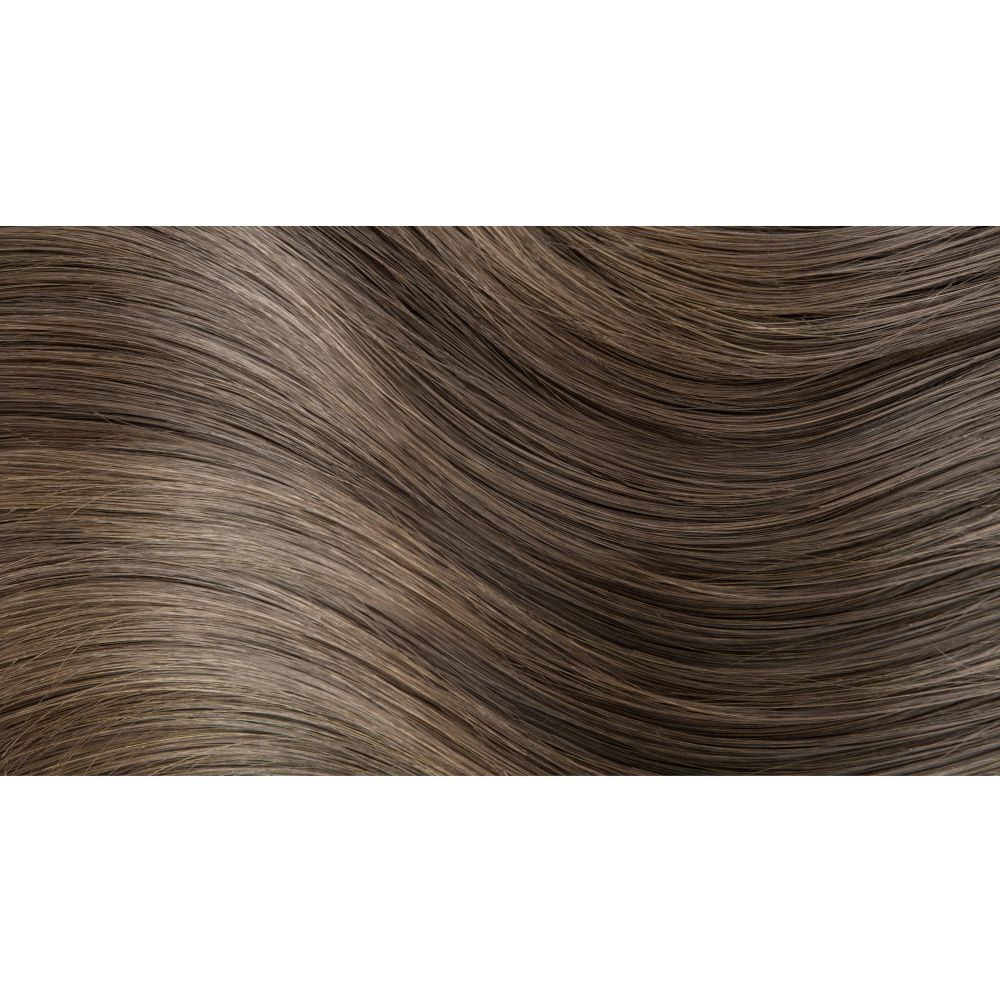 Ciocche di capelli in diverse tonalità di marrone. Primo piano. Visibili texture e sfumature di colore.