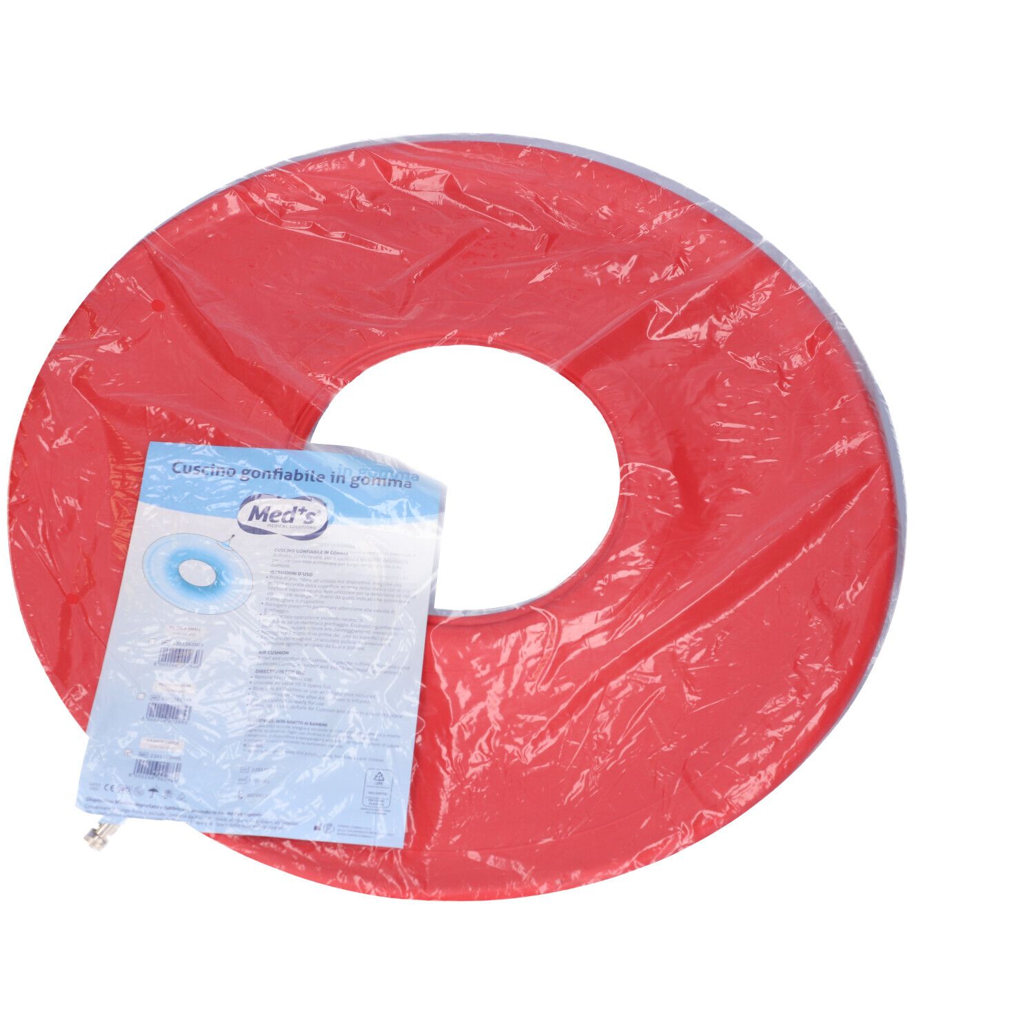 Cuscino antidecubito pneumatico rosso in gomma, confezionato in plastica. È incluso un foglietto illustrativo. Il marchio Med's è visibile.