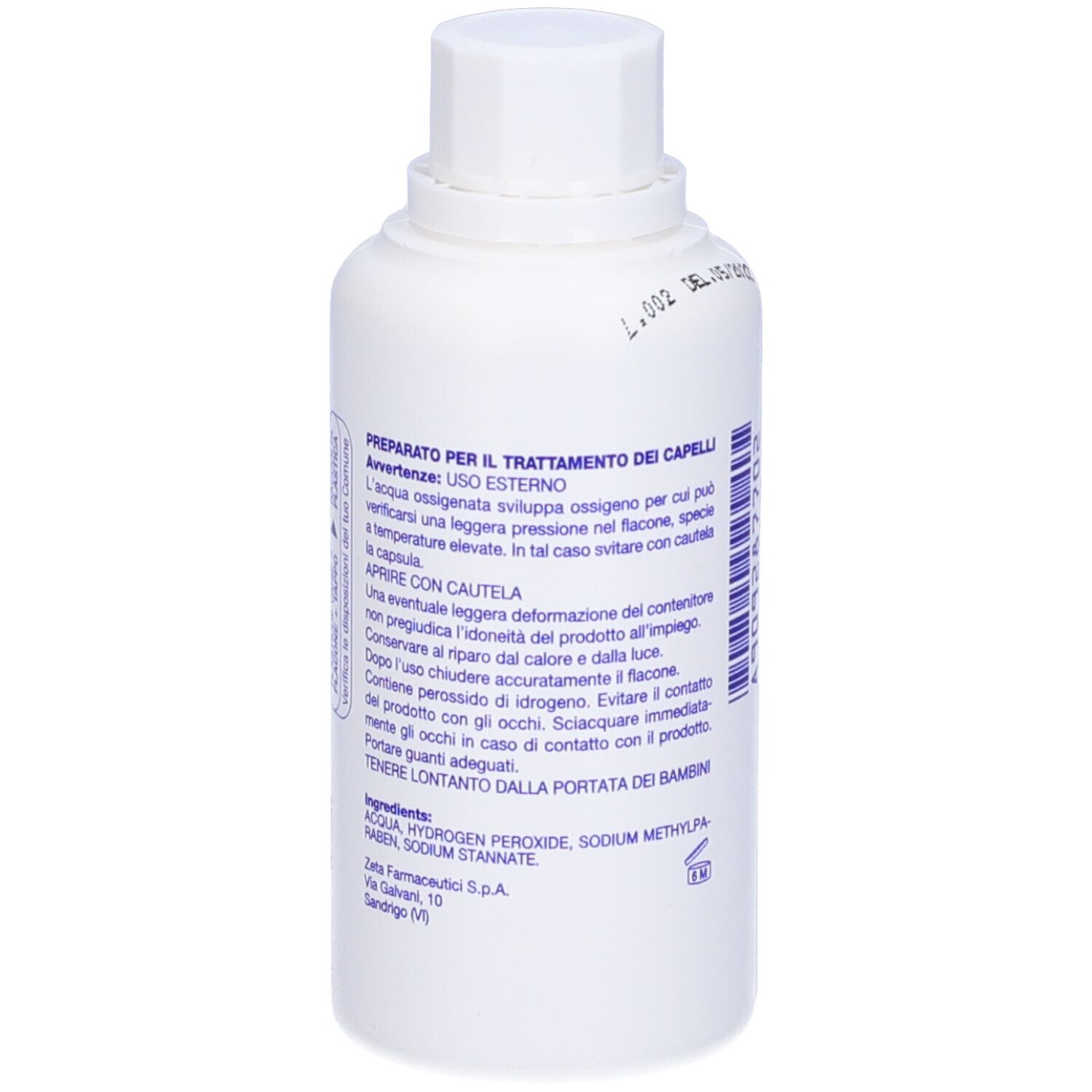 Flacone bianco con etichetta blu. Scritta: PREPARATO PER IL TRATTAMENTO DEI CAPELLI. Avvertenze e ingredienti.
