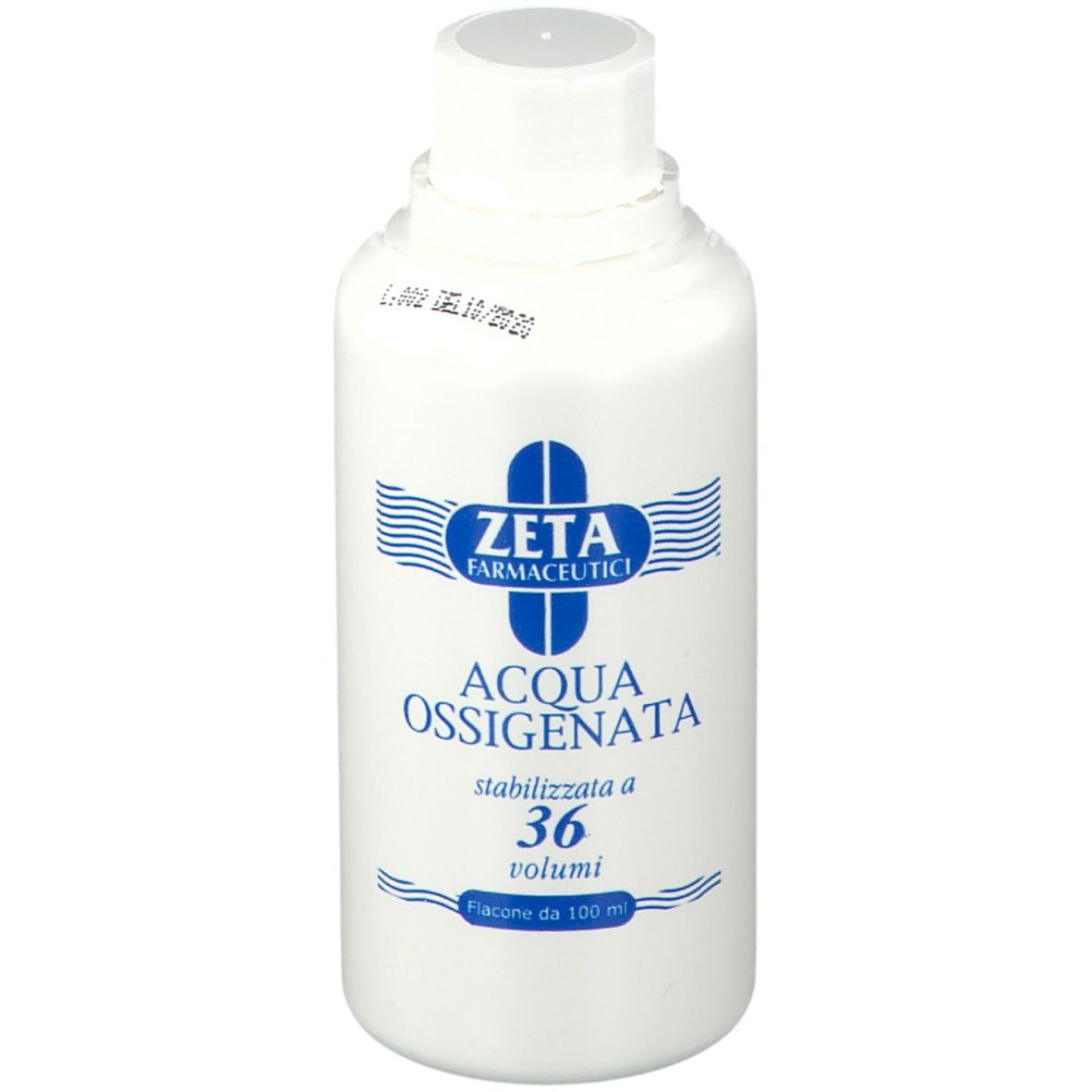 Flacon blanc avec étiquette bleue. Inscription: ZETA FARMACEUTICI, ACQUA OSSIGENATA, stabilizzata a 36 volumi. Flacon de 100 ml. Avec date.