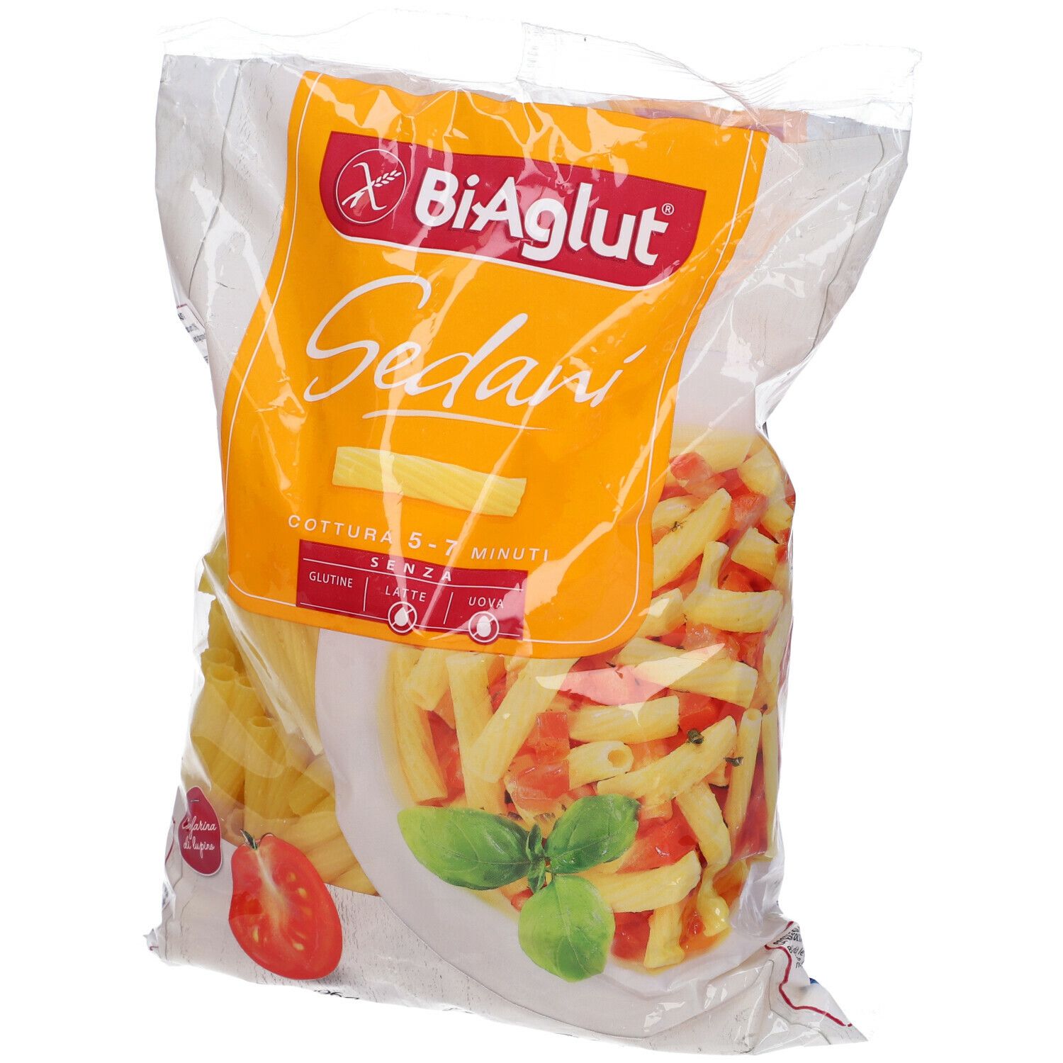 Confezione di pasta Biaglut Sedani. Pasta gialla in busta. Senza glutine, lattosio e soia. Pomodoro e basilico.
