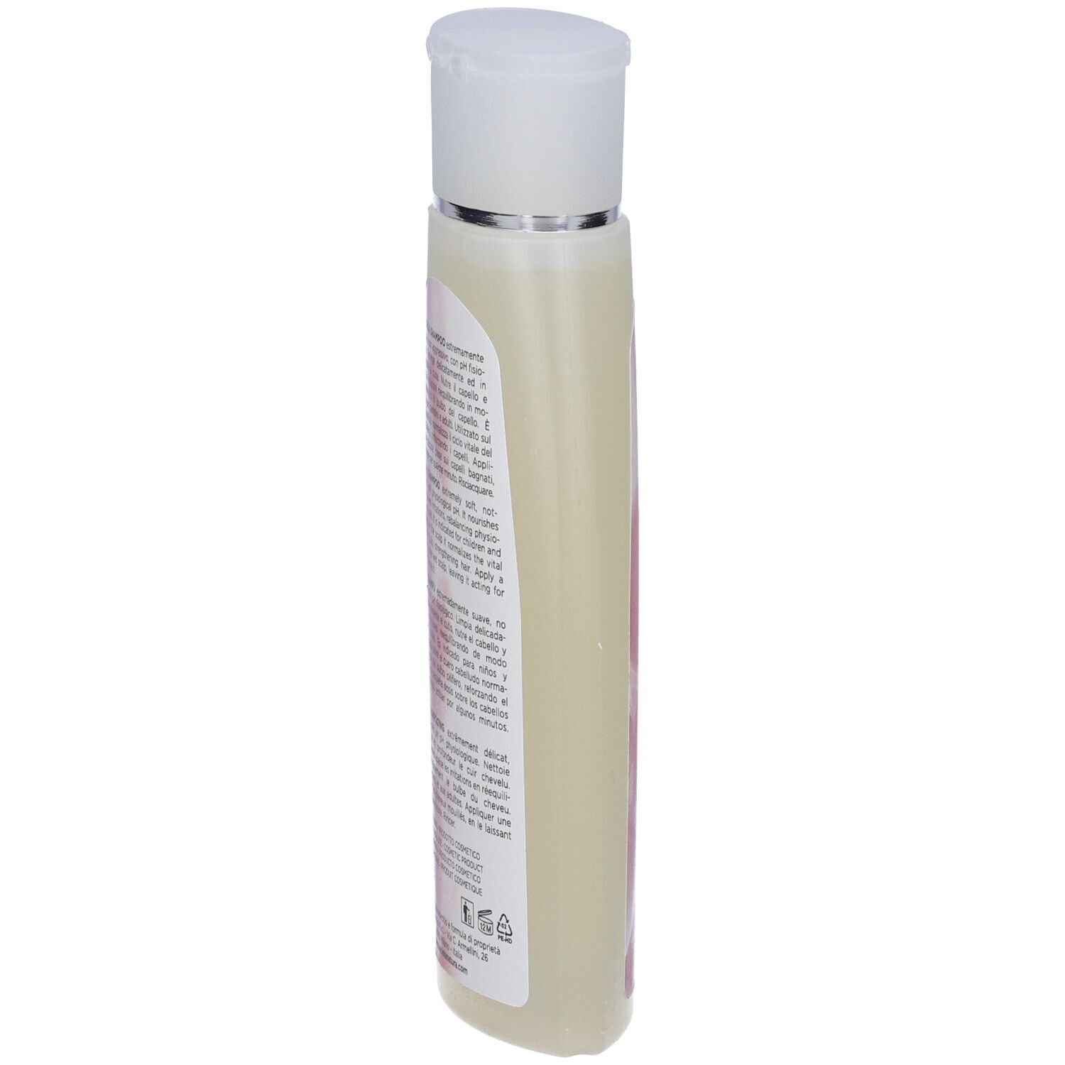 Flacone di shampoo Cryseida, vista laterale. Informazioni sul prodotto multilingue.